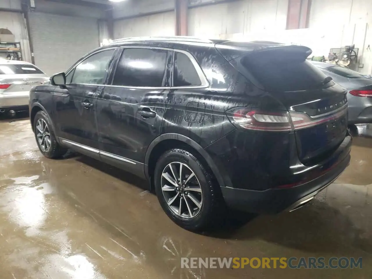 2 fotografías del automóvil dañado 2LMPJ6J93NBL08085 LINCOLN NAUTILUS 2022