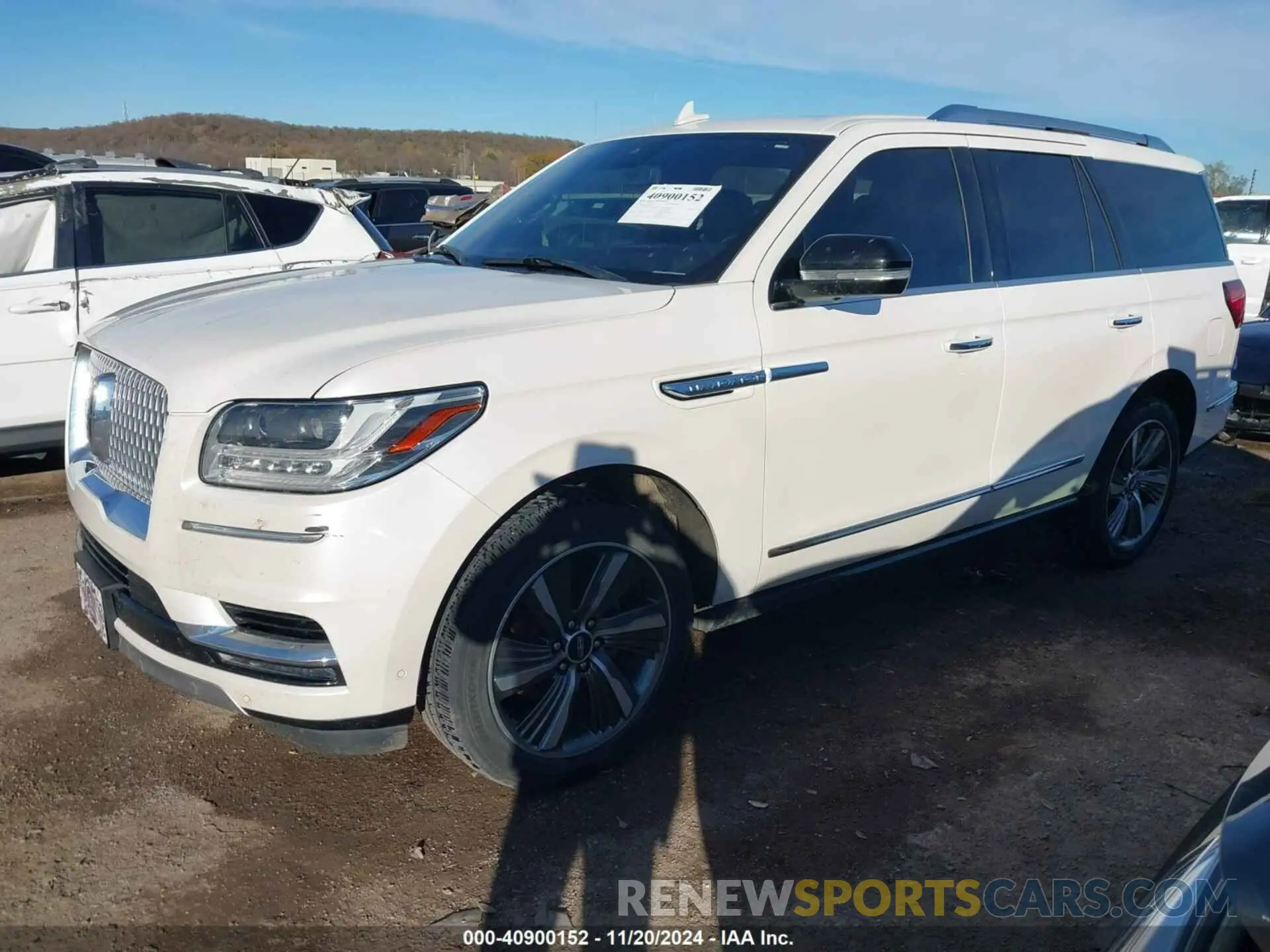 2 fotografías del automóvil dañado 5LMJJ2LT2KEL09194 LINCOLN NAVIGATOR 2019