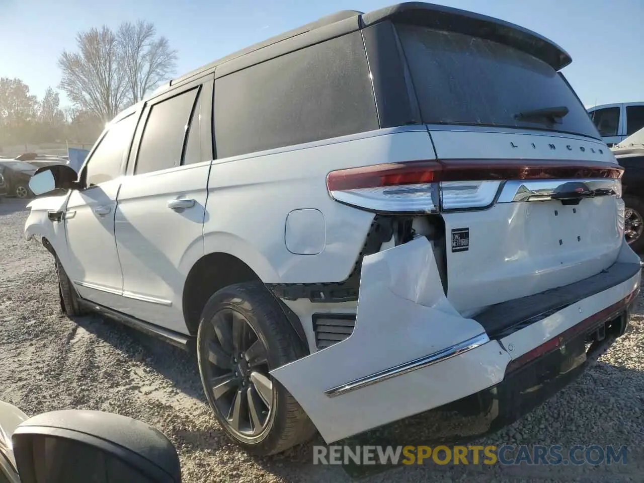 2 fotografías del automóvil dañado 5LMJJ2TT6NEL02298 LINCOLN NAVIGATOR 2022