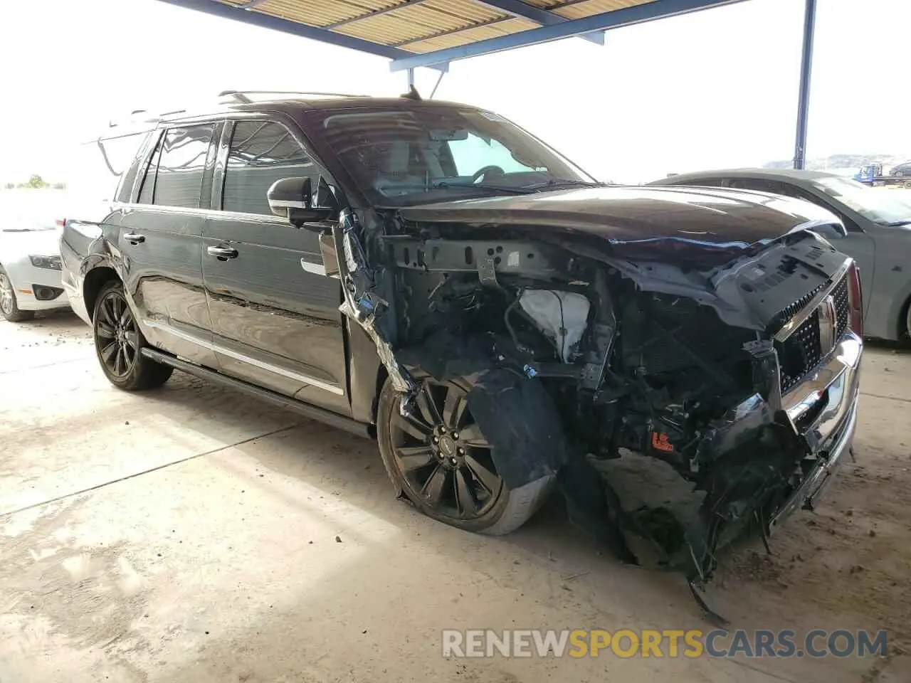 4 fotografías del automóvil dañado 5LMJJ3LT4NEL04511 LINCOLN NAVIGATOR 2022