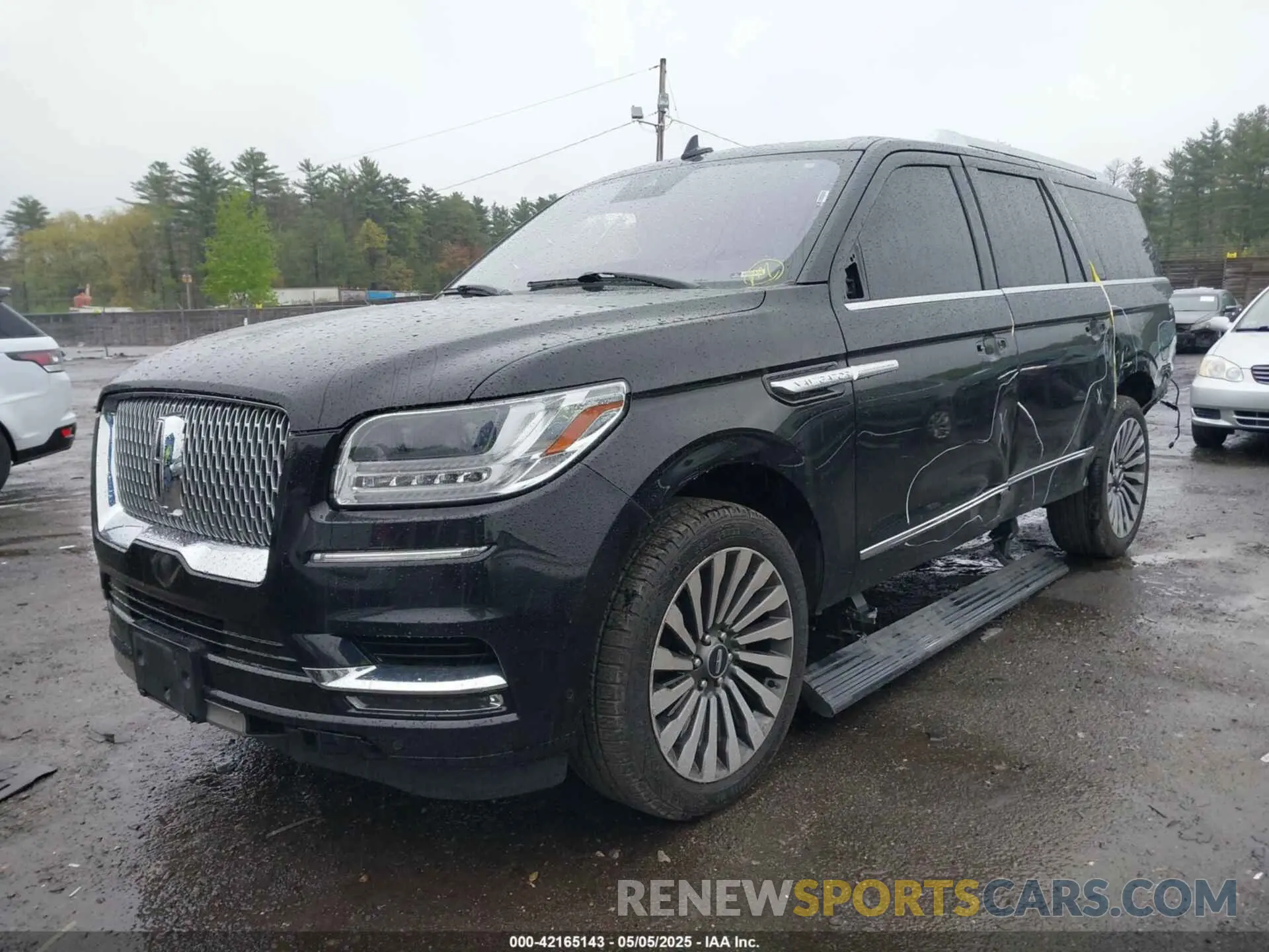 2 fotografías del automóvil dañado 5LMJJ3LT3KEL23451 LINCOLN NAVIGATOR L 2019