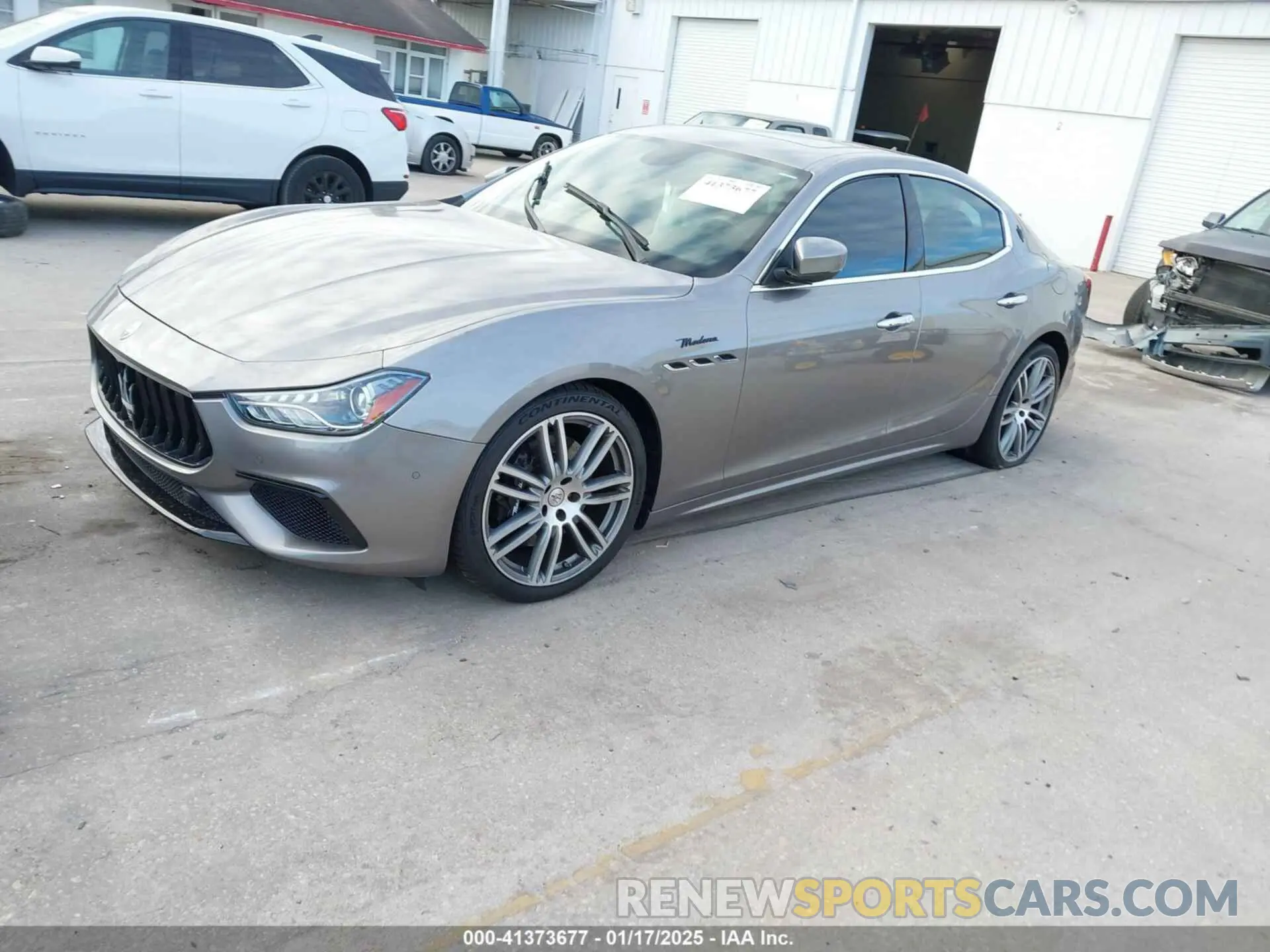 2 fotografías del automóvil dañado ZAM57YSM2N1391410 MASERATI GHIBLI 2022