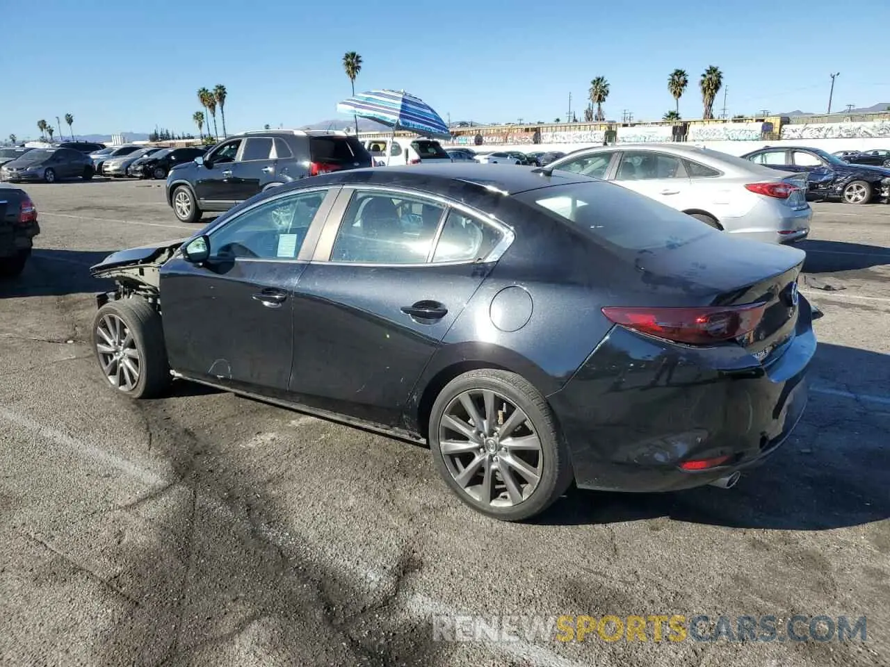 2 fotografías del automóvil dañado 3MZBPADL3KM108737 MAZDA 3 2019