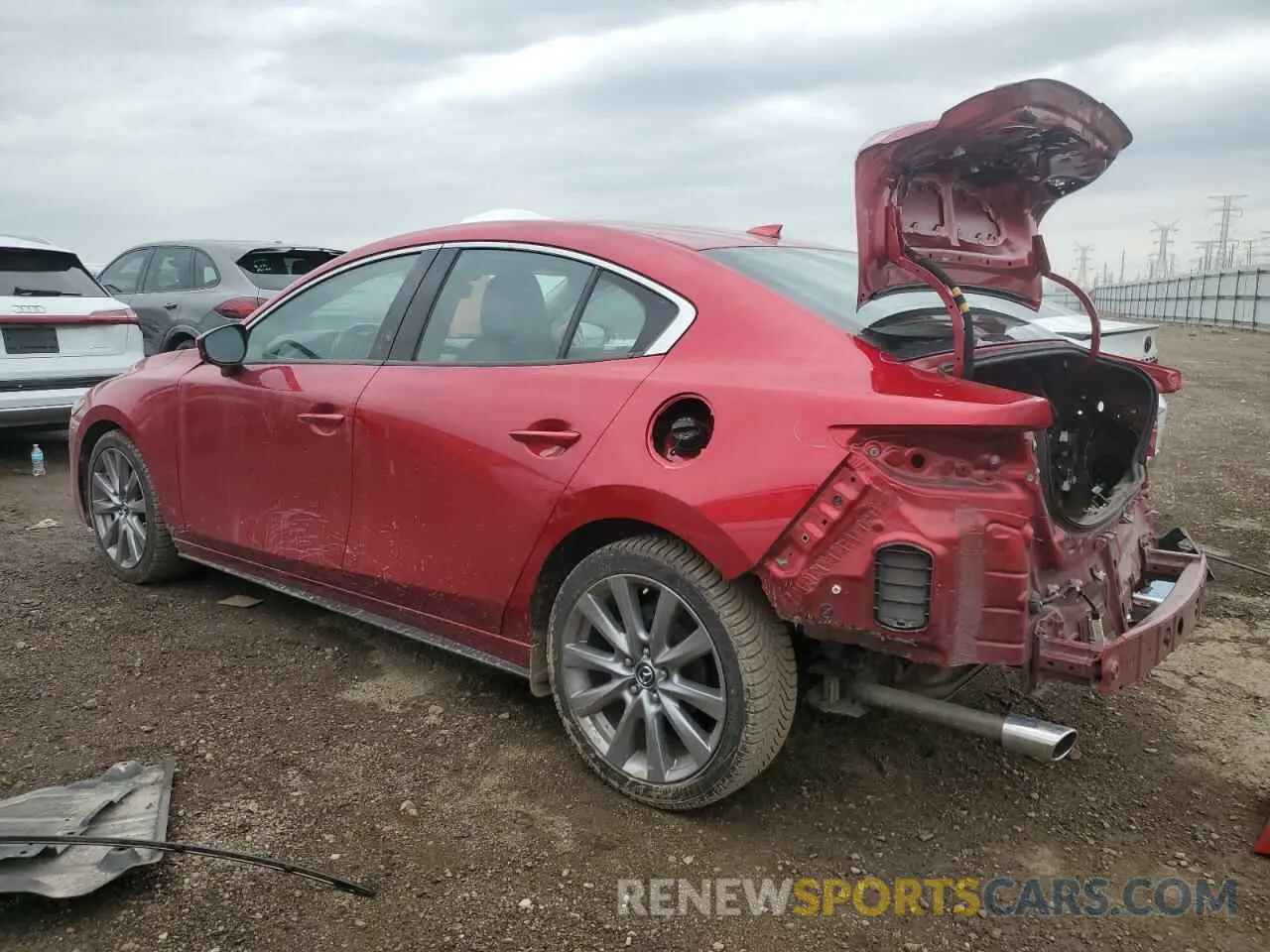 2 fotografías del automóvil dañado 3MZBPAEM6KM103409 MAZDA 3 2019