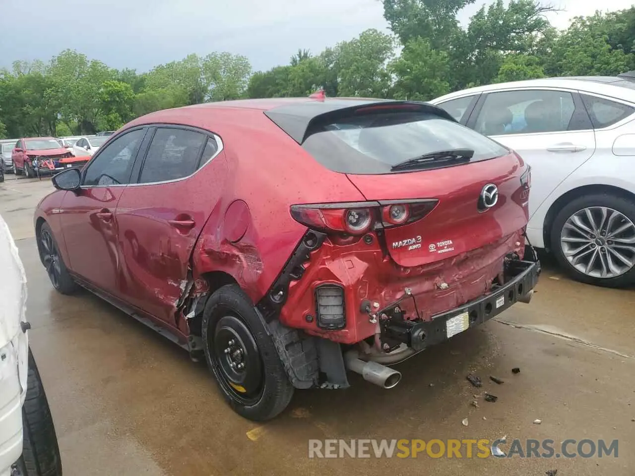 2 fotografías del automóvil dañado JM1BPBNM9K1124082 MAZDA 3 2019