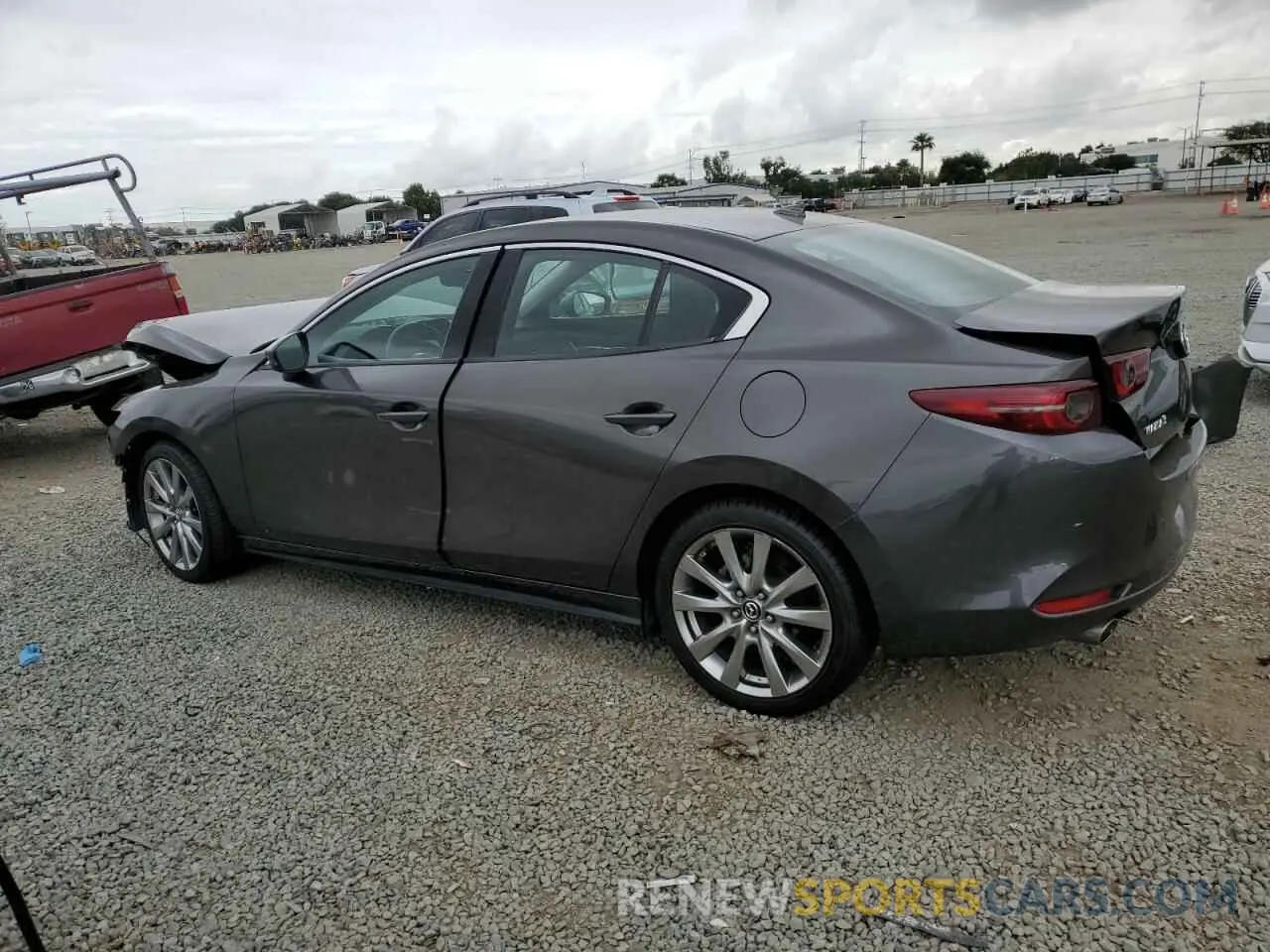 2 fotografías del automóvil dañado 3MZBPAEM1LM127828 MAZDA 3 2020