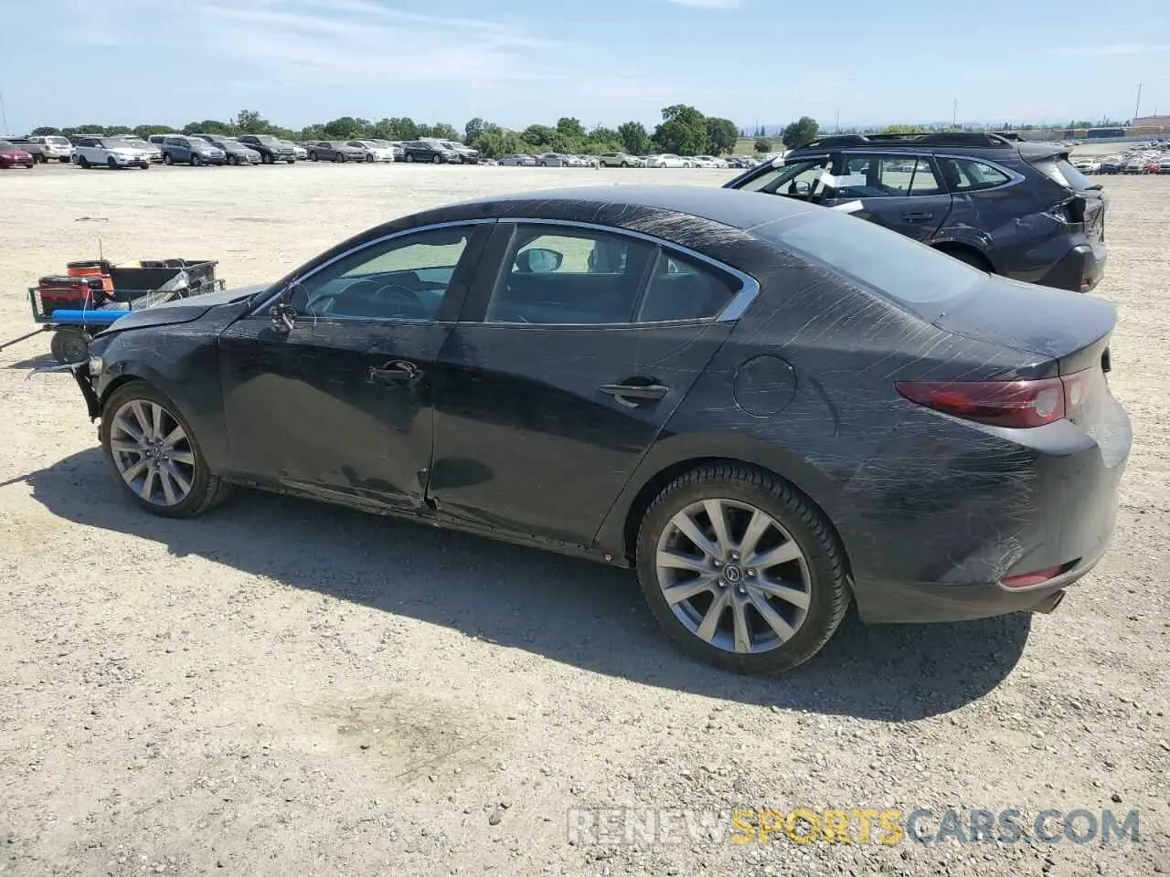 2 fotografías del automóvil dañado 3MZBPABM0MM208227 MAZDA 3 2021
