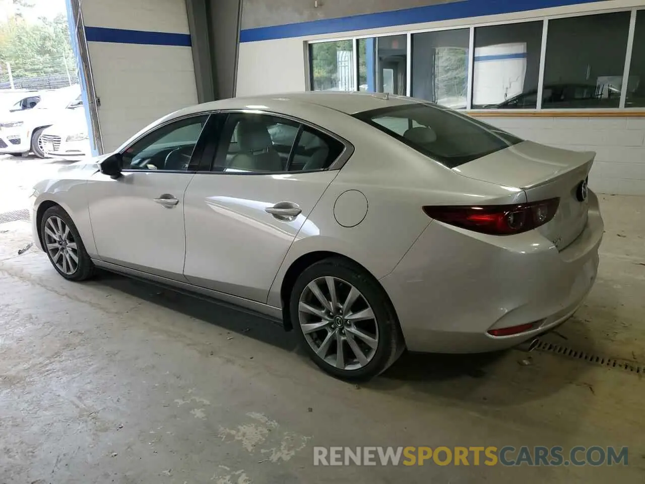 2 fotografías del automóvil dañado 3MZBPADL3NM317206 MAZDA 3 2022