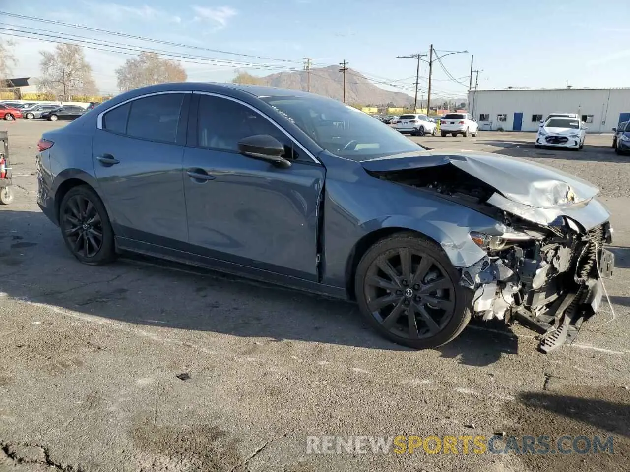 4 fotografías del automóvil dañado 3MZBPBAY4NM319231 MAZDA 3 2022