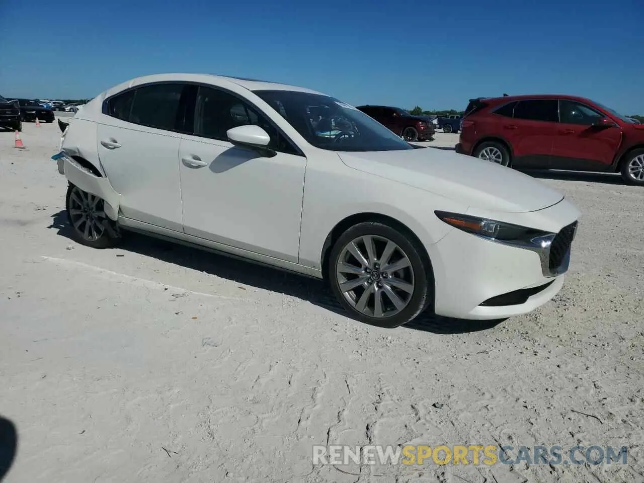 4 fotografías del automóvil dañado 3MZBPBDL8NM318955 MAZDA 3 2022