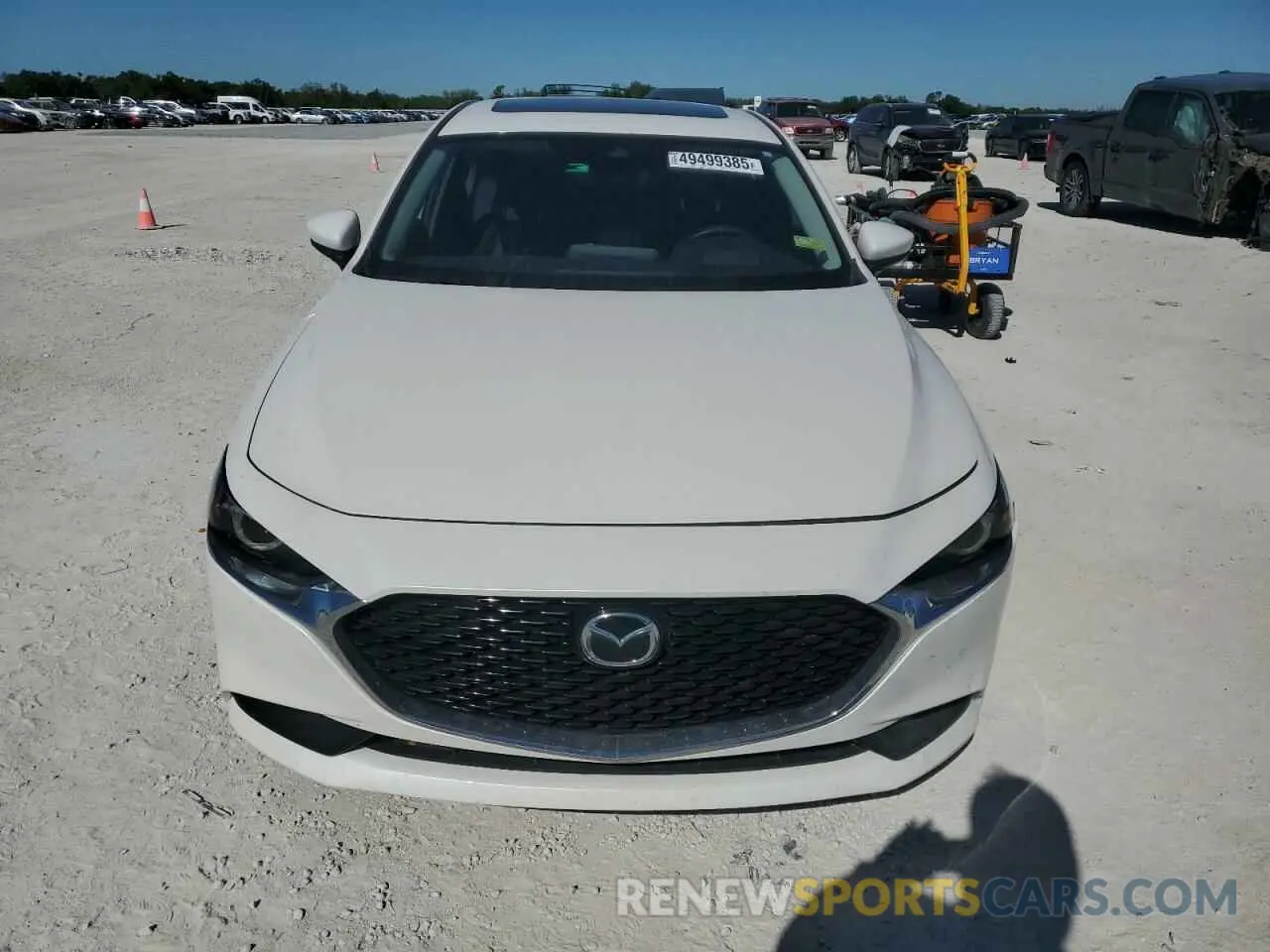 5 fotografías del automóvil dañado 3MZBPBDL8NM318955 MAZDA 3 2022