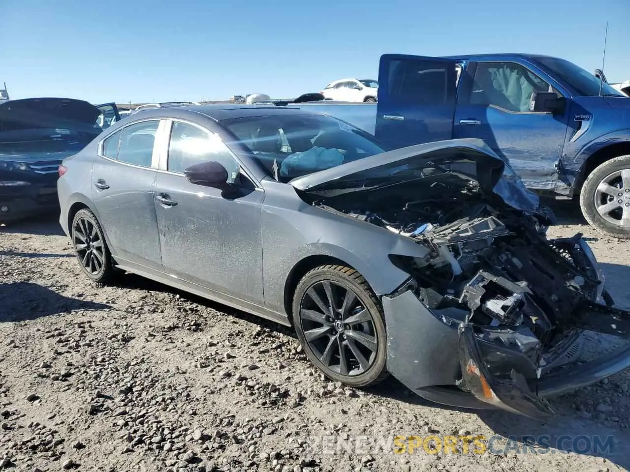 4 fotografías del automóvil dañado JM1BPACL4N1506724 MAZDA 3 2022