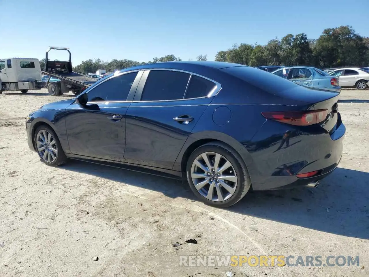 2 fotografías del automóvil dañado 3MZBPABM2PM372034 MAZDA 3 2023