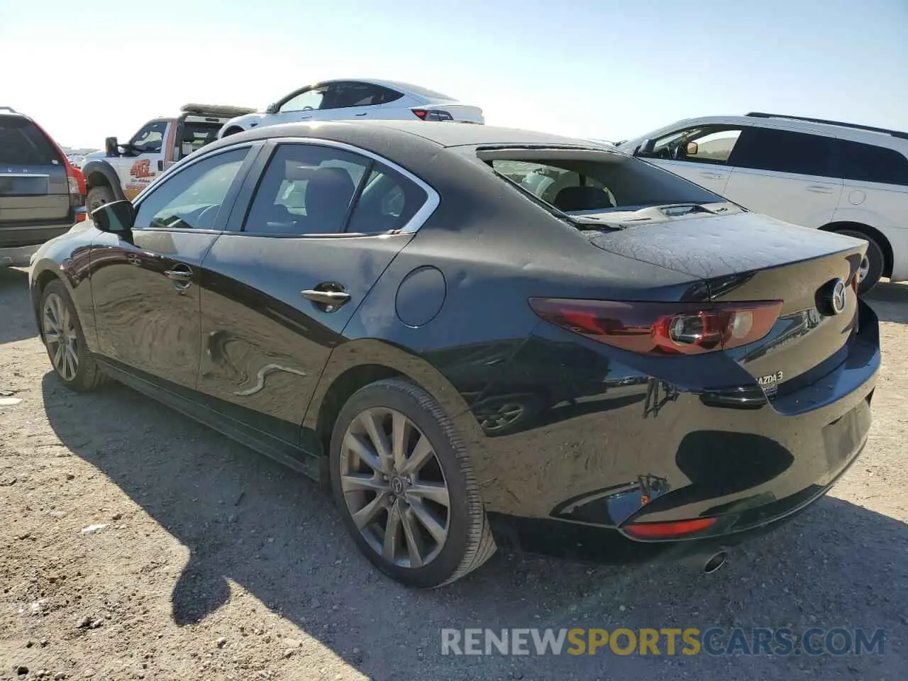 2 fotografías del automóvil dañado 3MZBPABM9PM373312 MAZDA 3 2023