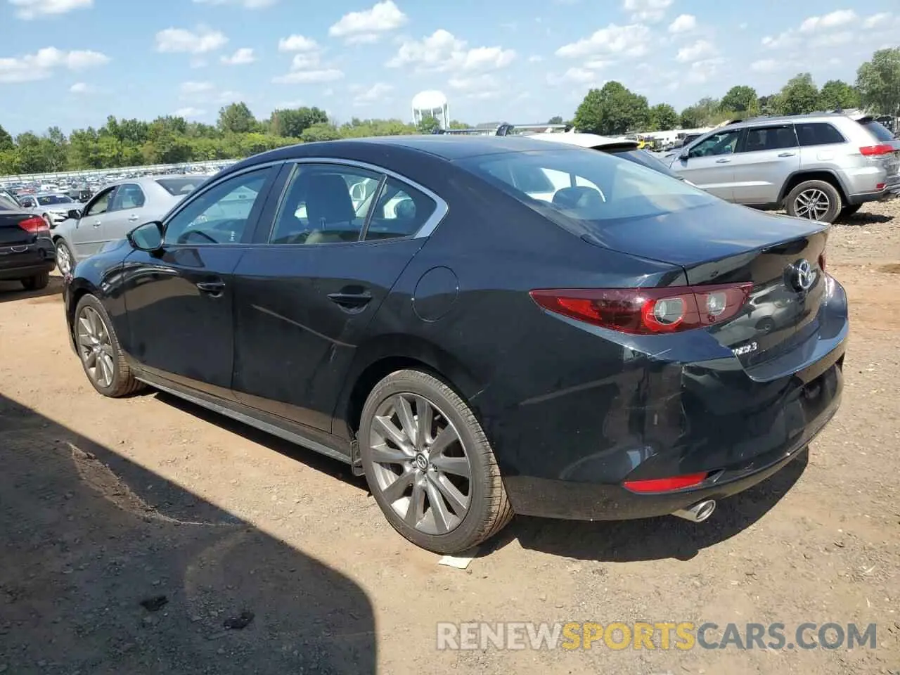2 fotografías del automóvil dañado 3MZBPACM2RM404675 MAZDA 3 2024