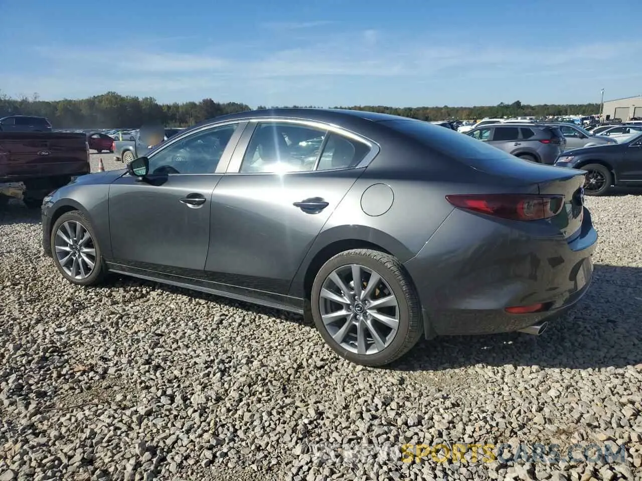 2 fotografías del automóvil dañado 3MZBPACM8RM422808 MAZDA 3 2024