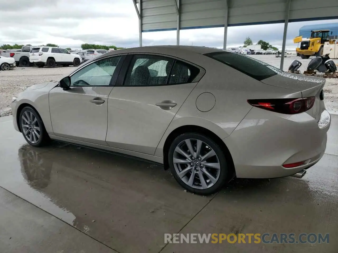 2 fotografías del automóvil dañado 3MZBPACM9RM414491 MAZDA 3 2024