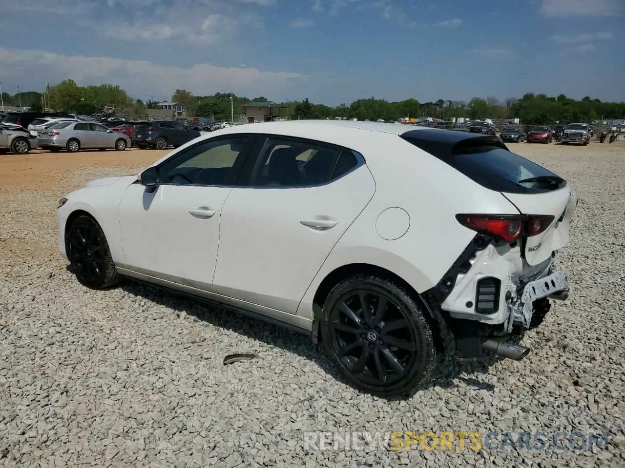 2 fotografías del automóvil dañado JM1BPALM6R1654162 MAZDA 3 2024