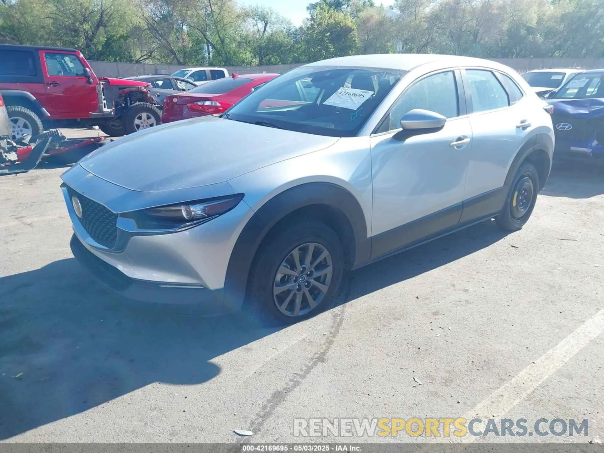 2 fotografías del automóvil dañado 3MVDMBBL0LM122463 MAZDA CX-30 2020