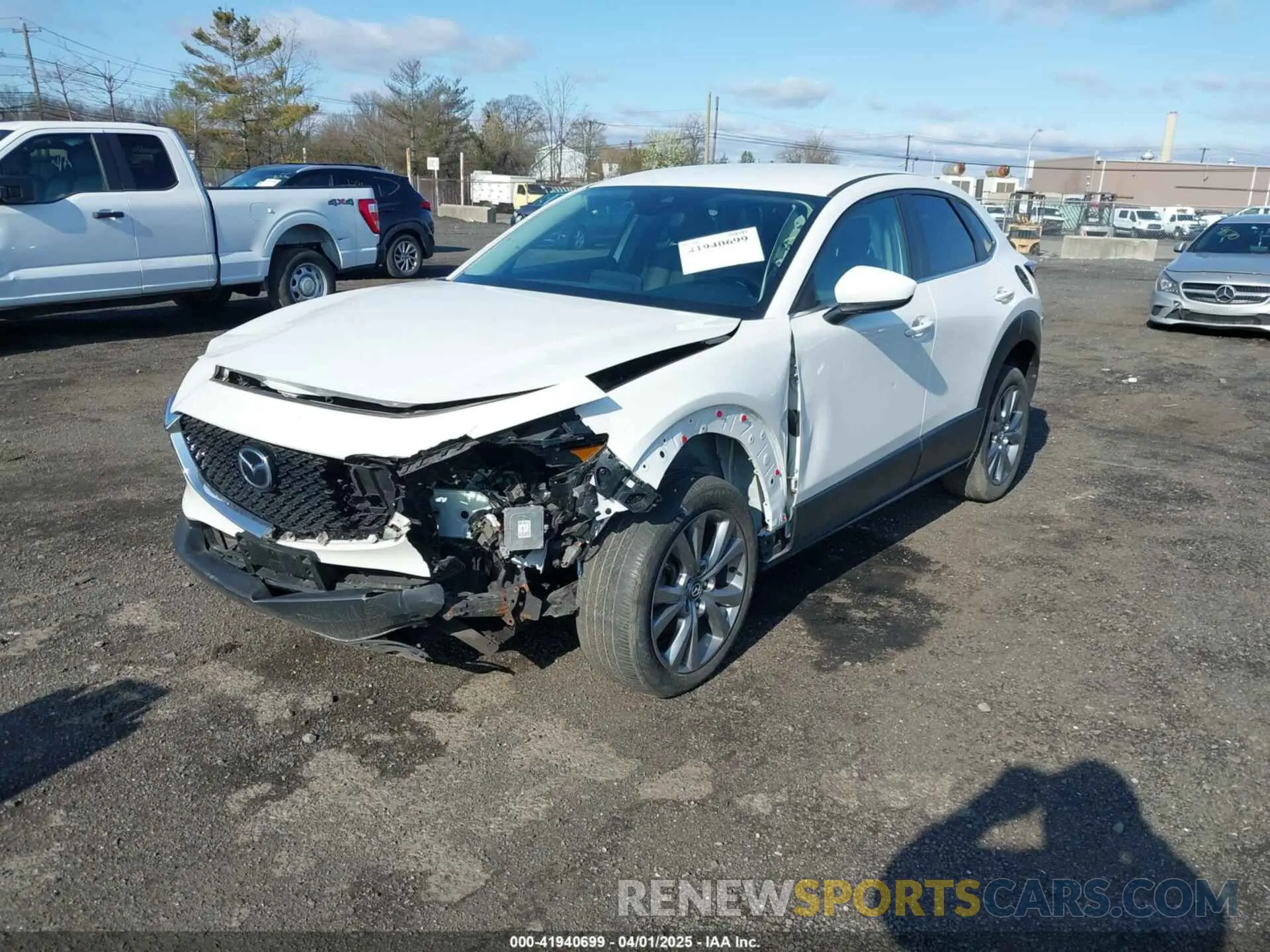 2 fotografías del automóvil dañado 3MVDMBDL6LM135604 MAZDA CX-30 2020