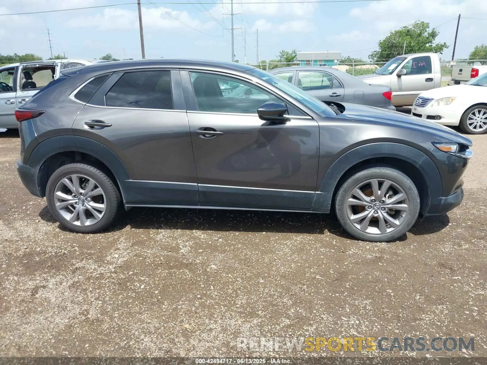 13 fotografías del automóvil dañado 3MVDMABL7MM221566 MAZDA CX-30 2021