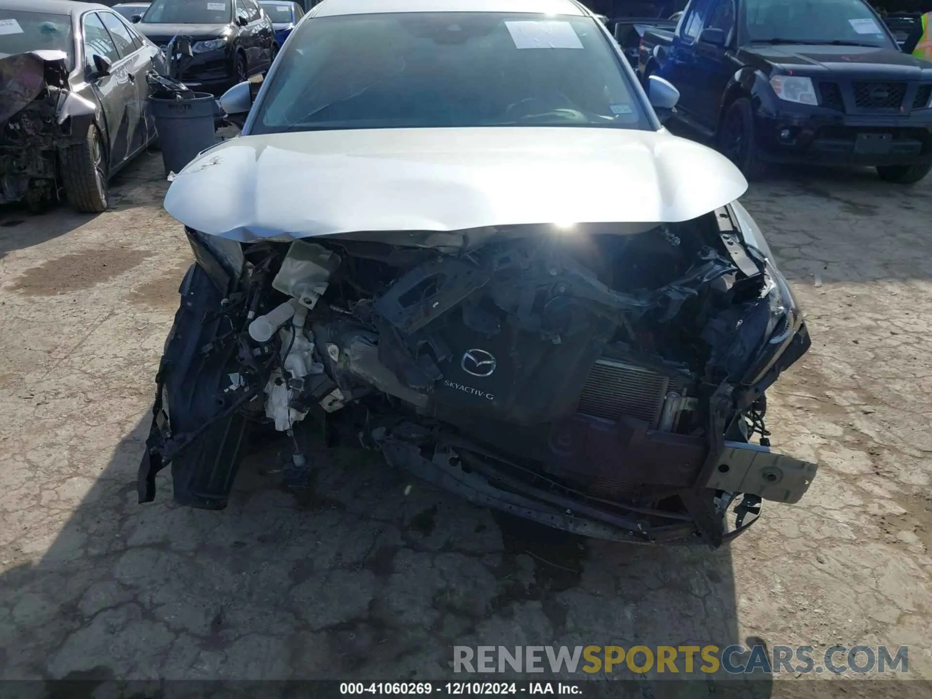 13 fotografías del automóvil dañado 3MVDMABL7MM228386 MAZDA CX-30 2021