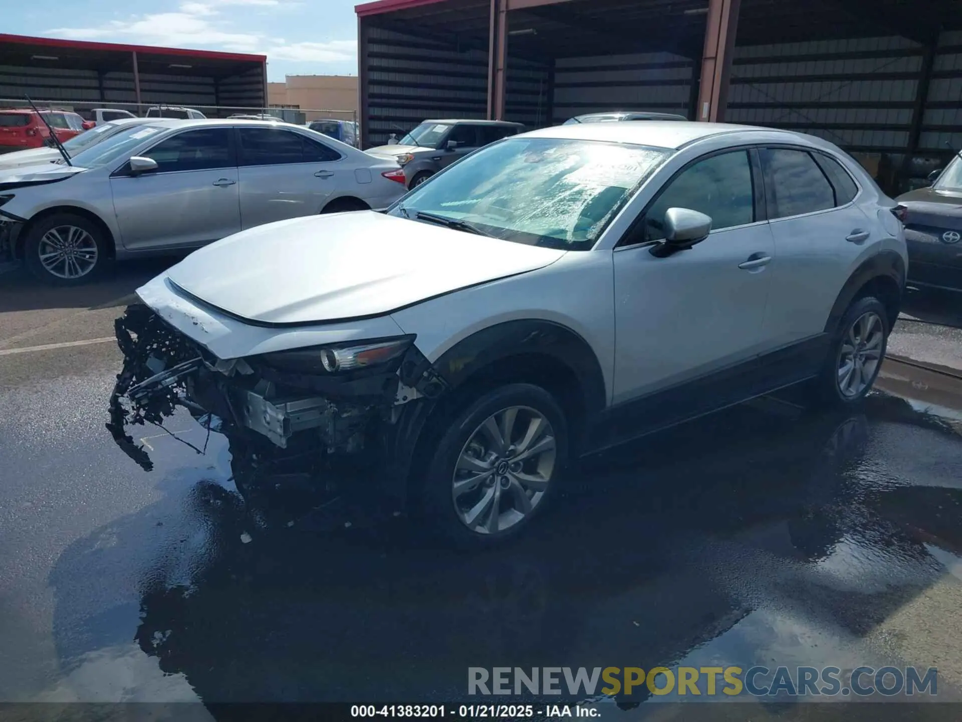 2 fotografías del automóvil dañado 3MVDMABLXMM221559 MAZDA CX-30 2021