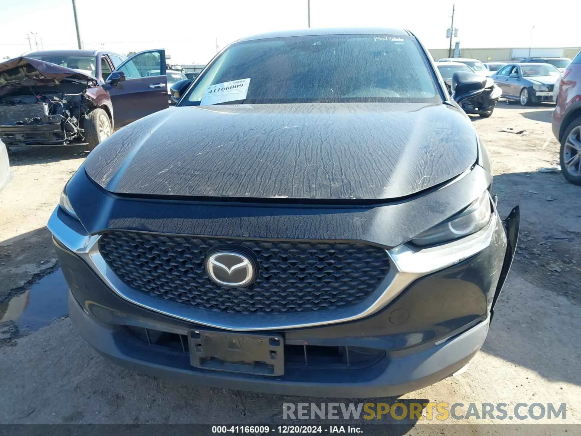 12 fotografías del automóvil dañado 3MVDMBBL1MM260529 MAZDA CX-30 2021