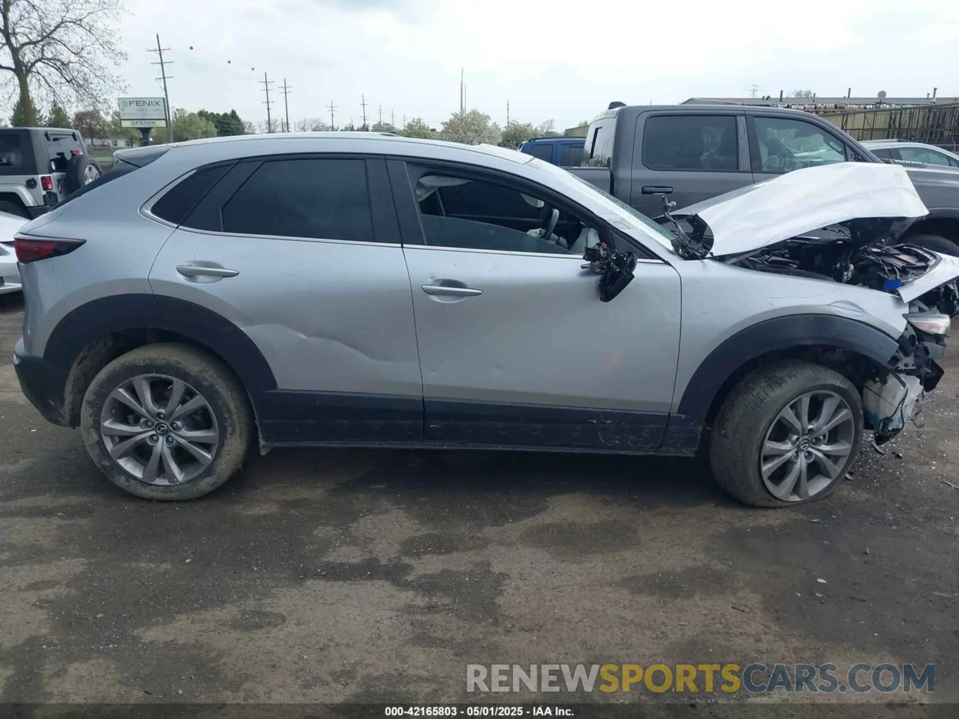 12 fotografías del automóvil dañado 3MVDMBCL6MM240663 MAZDA CX-30 2021