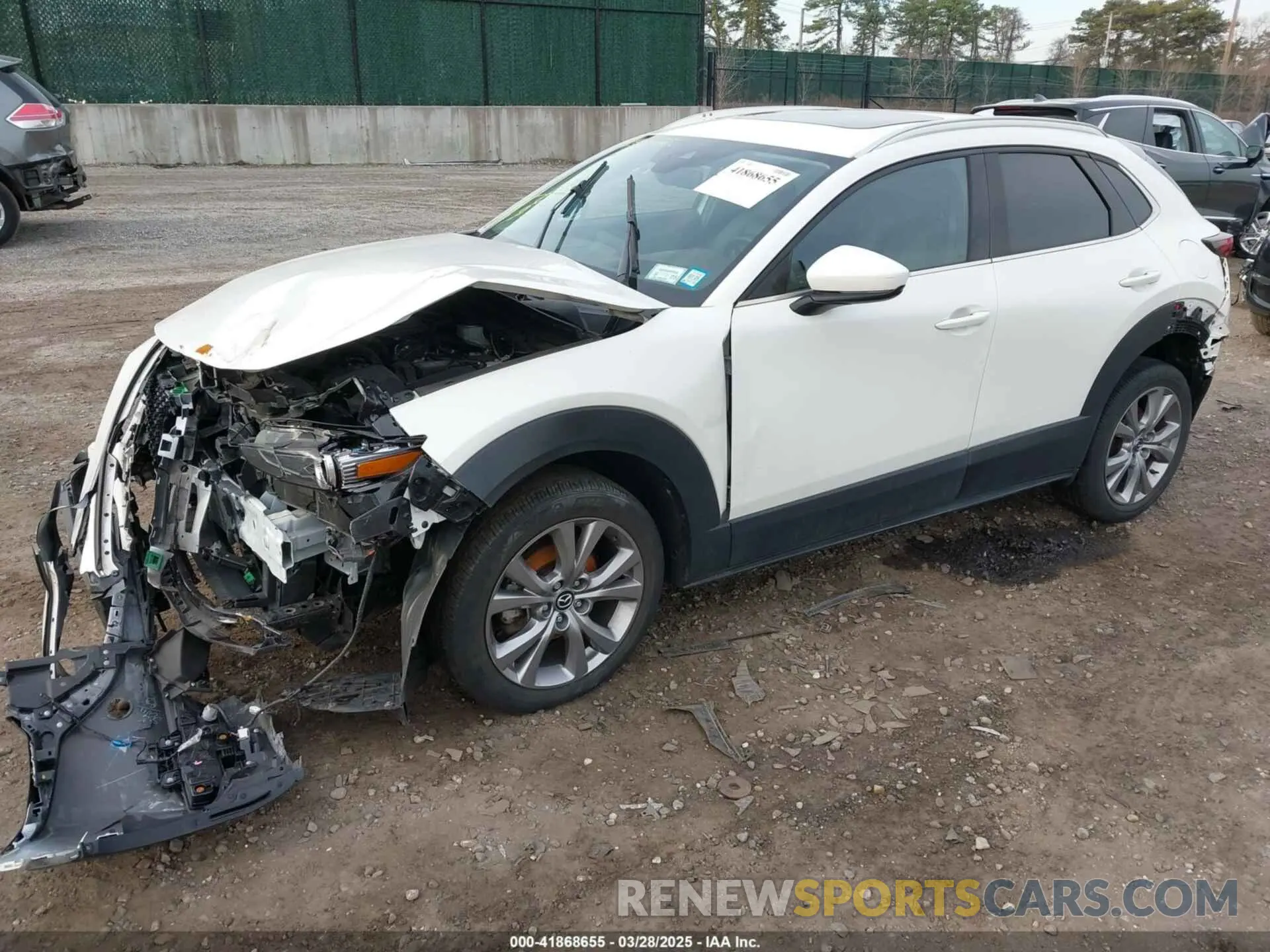 2 fotografías del automóvil dañado 3MVDMBDL4MM310630 MAZDA CX-30 2021