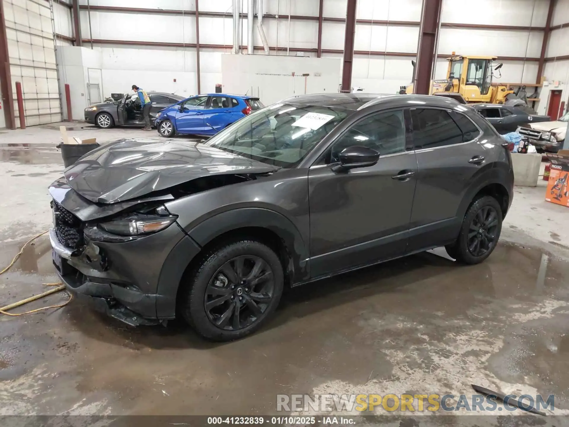 2 fotografías del automóvil dañado 3MVDMBEYXMM302297 MAZDA CX-30 2021