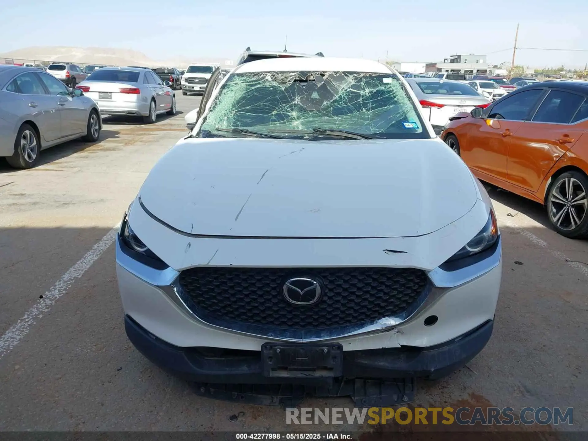 12 fotografías del automóvil dañado 3MVDMBAL9NM415797 MAZDA CX-30 2022