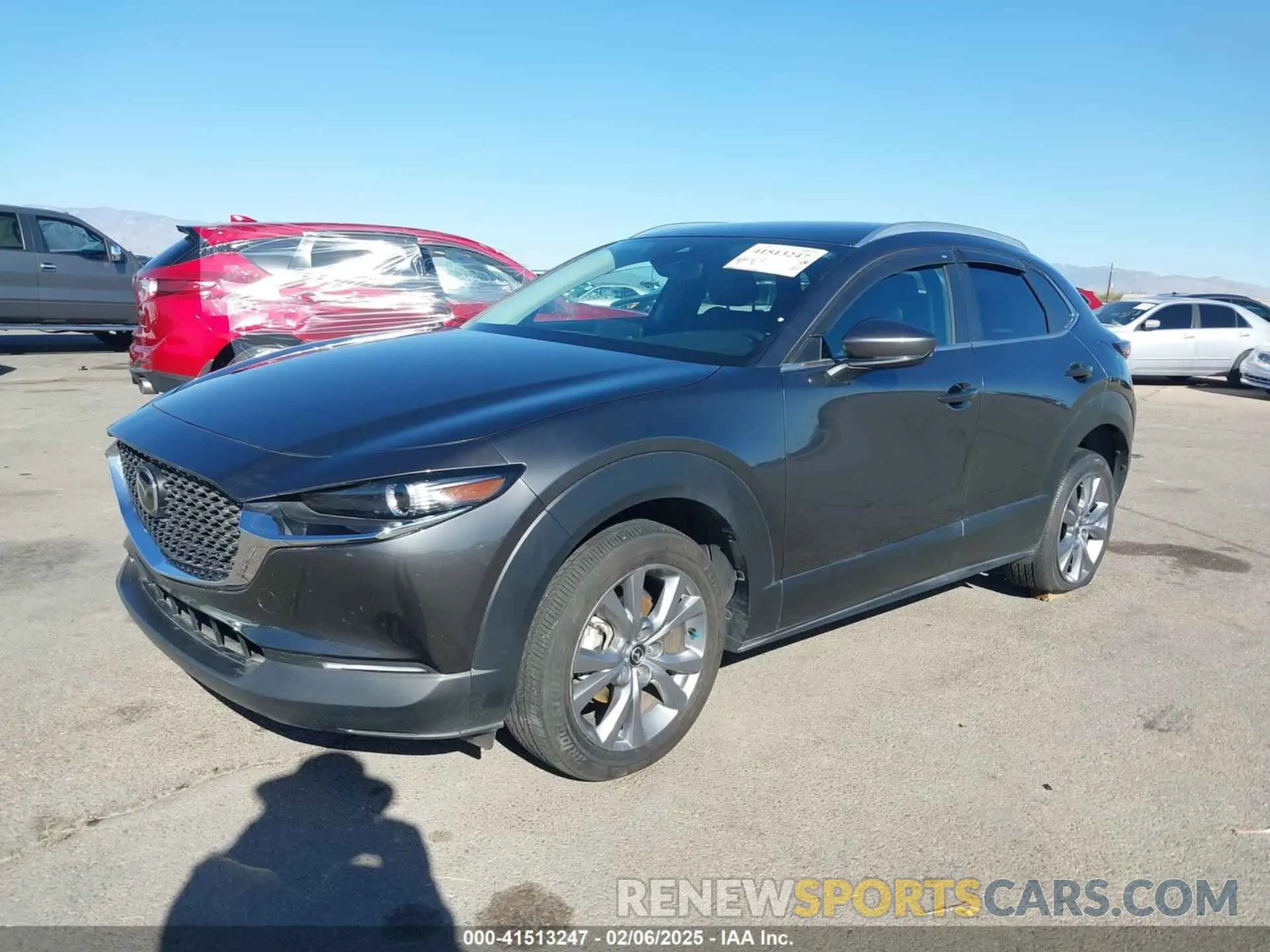 2 fotografías del automóvil dañado 3MVDMBBL0NM415511 MAZDA CX-30 2022