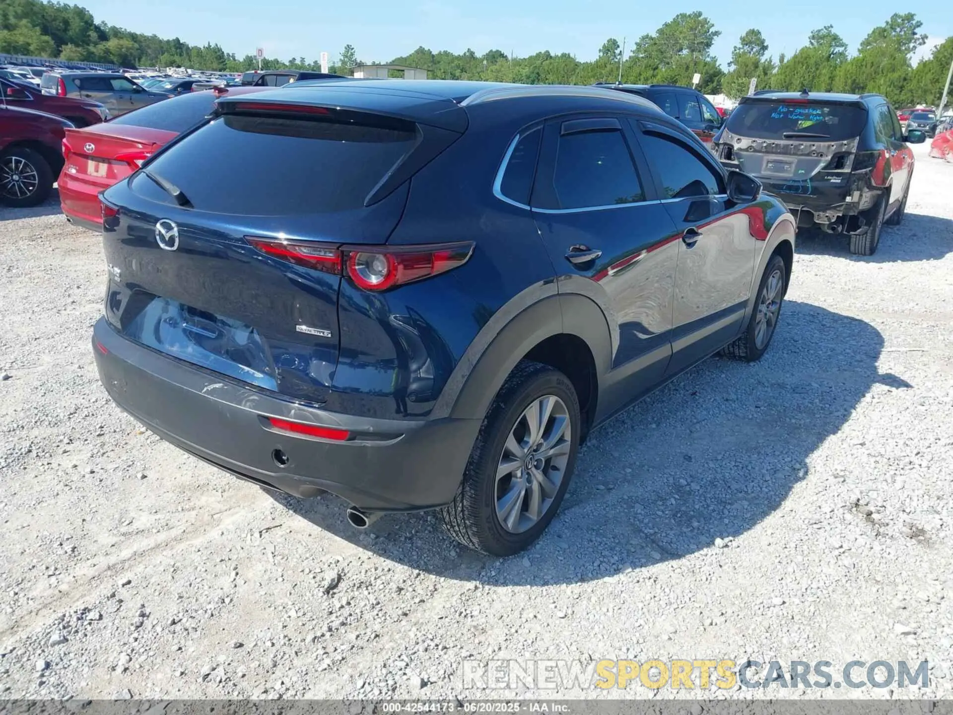 4 fotografías del automóvil dañado 3MVDMBBL3NM412571 MAZDA CX-30 2022