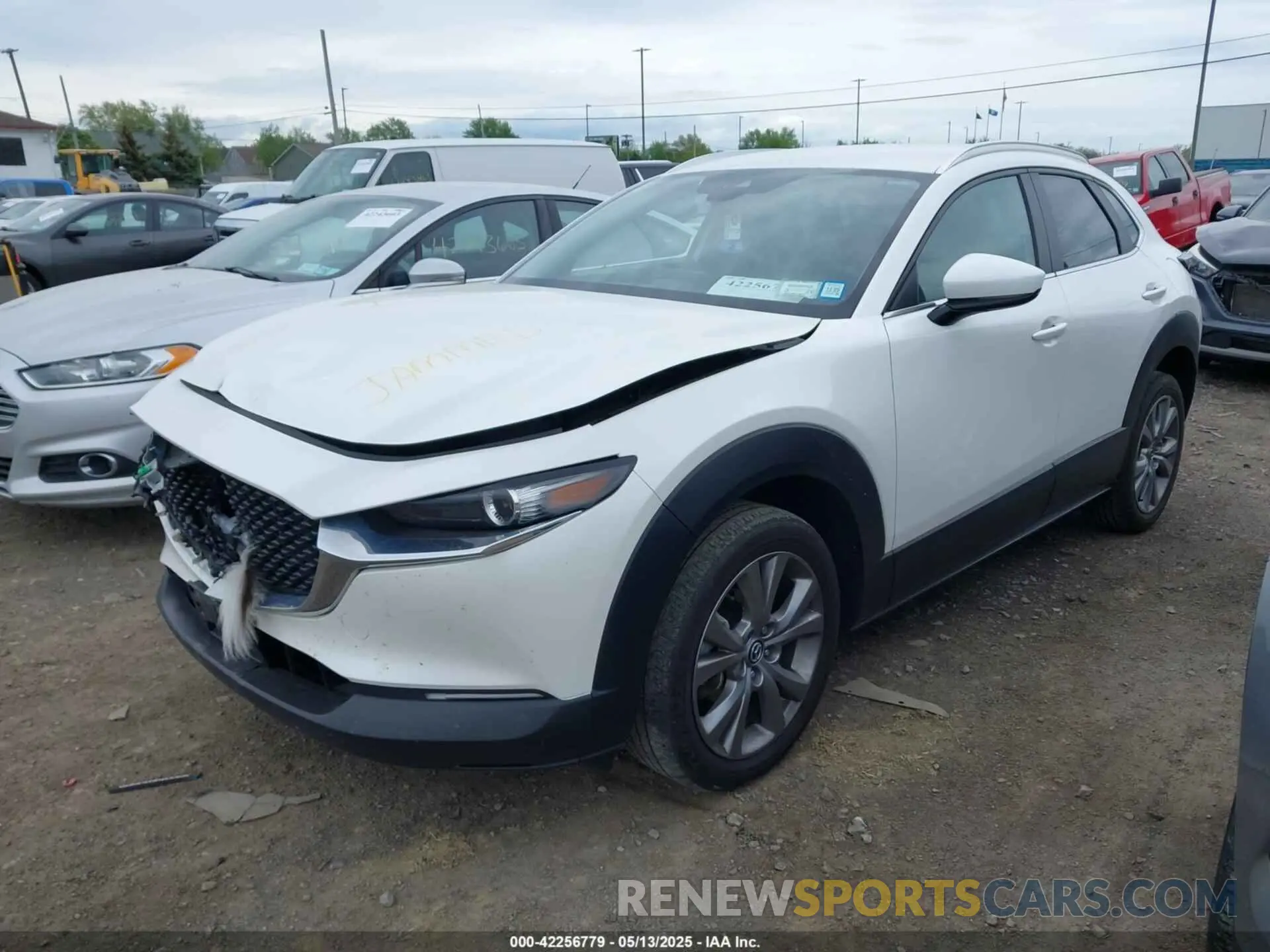 2 fotografías del automóvil dañado 3MVDMBBL6NM448870 MAZDA CX-30 2022