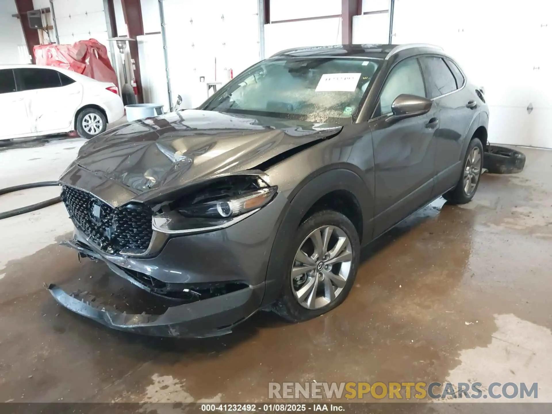 2 fotografías del automóvil dañado 3MVDMBCL3NM422029 MAZDA CX-30 2022