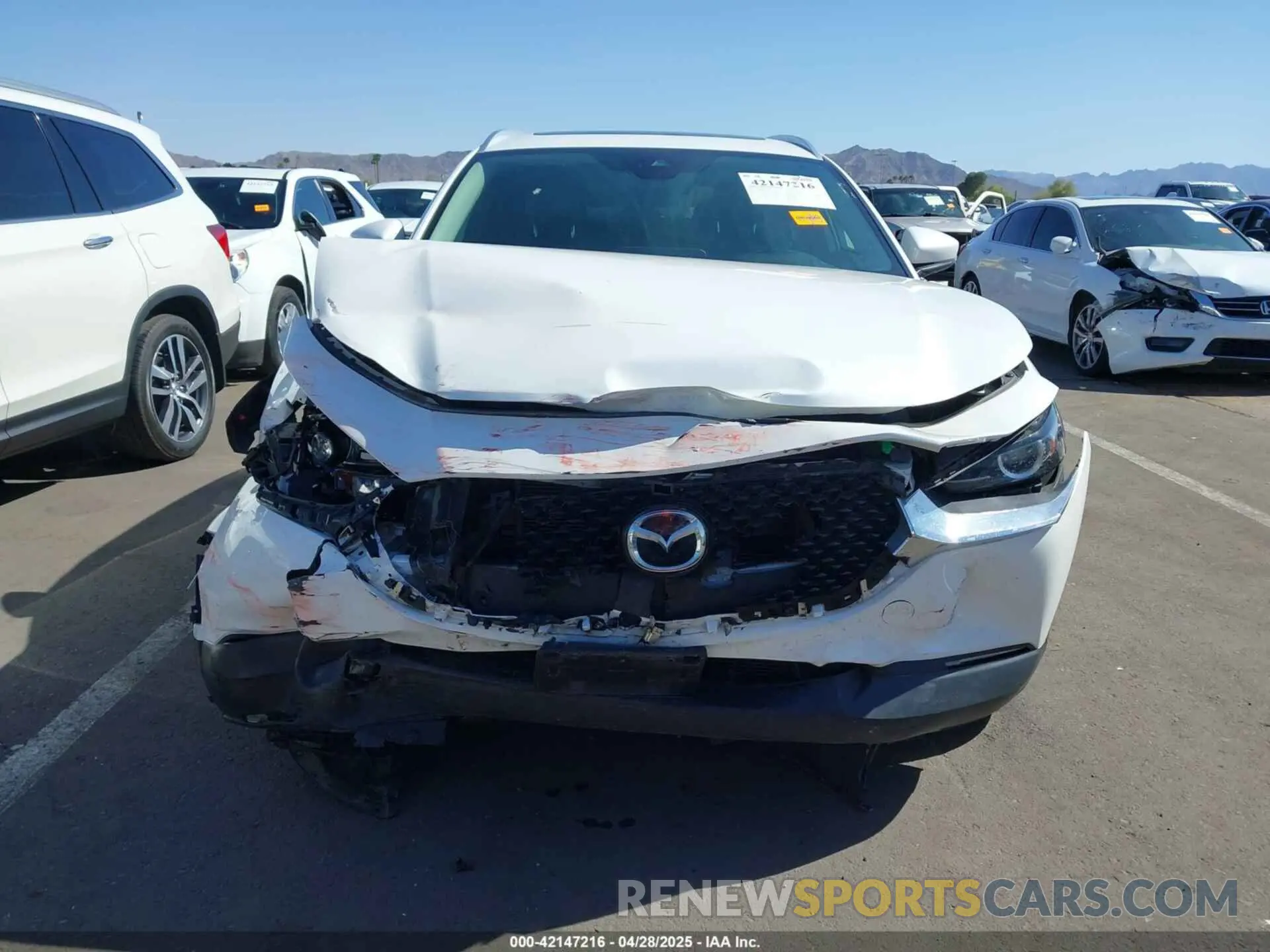 12 fotografías del automóvil dañado 3MVDMBCL4NM454228 MAZDA CX-30 2022