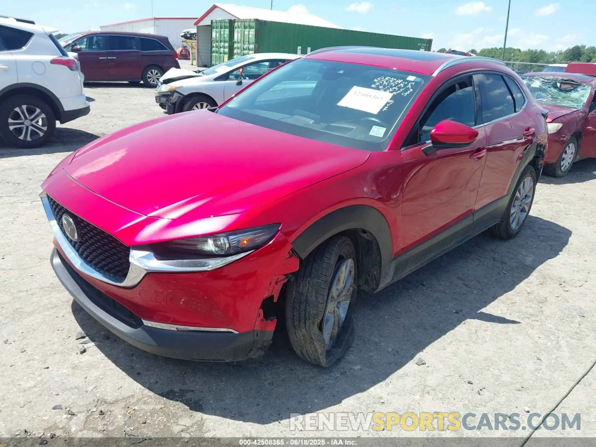2 fotografías del automóvil dañado 3MVDMBDL2NM413756 MAZDA CX-30 2022