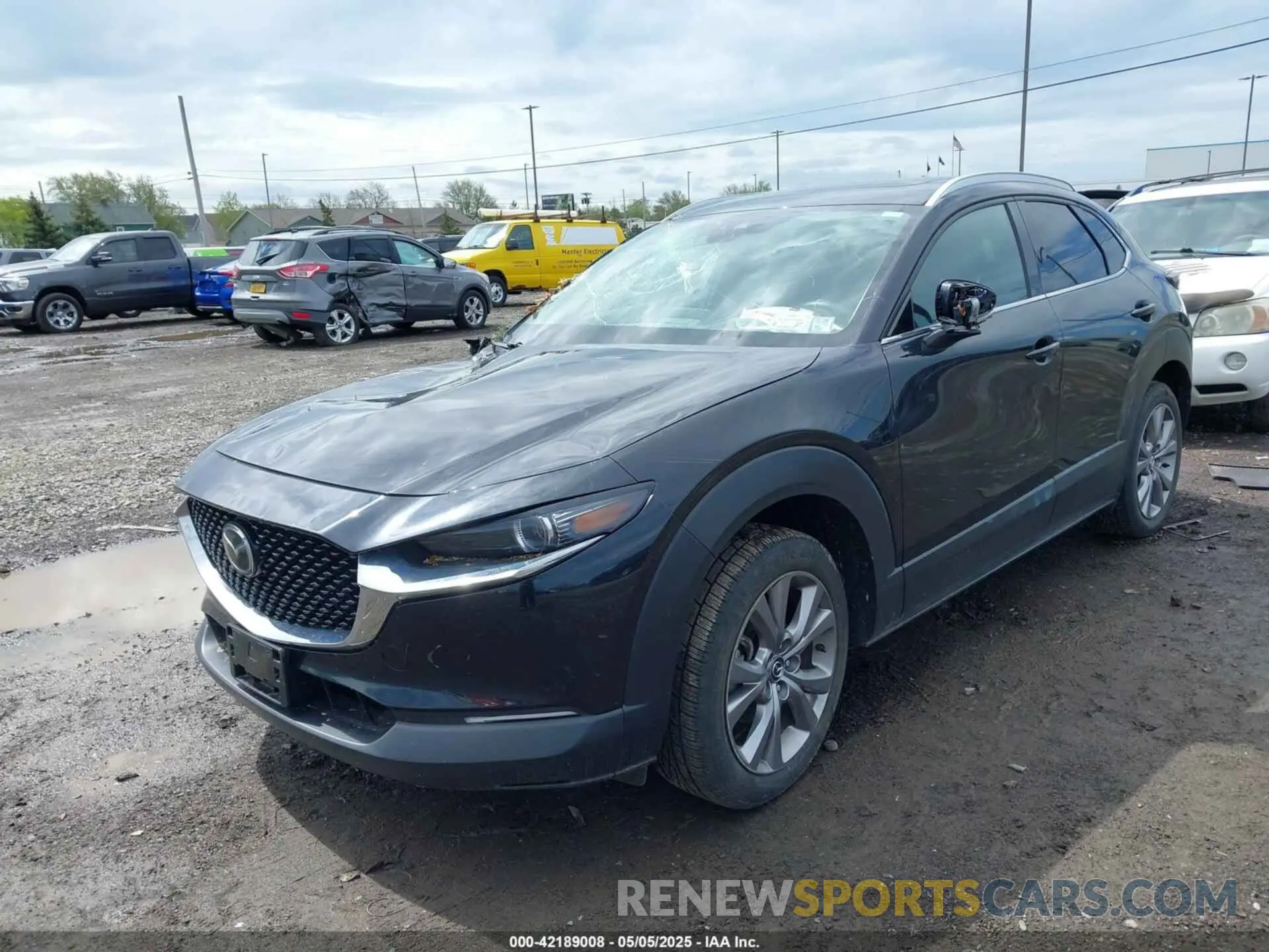 2 fotografías del automóvil dañado 3MVDMBDL5NM413878 MAZDA CX-30 2022