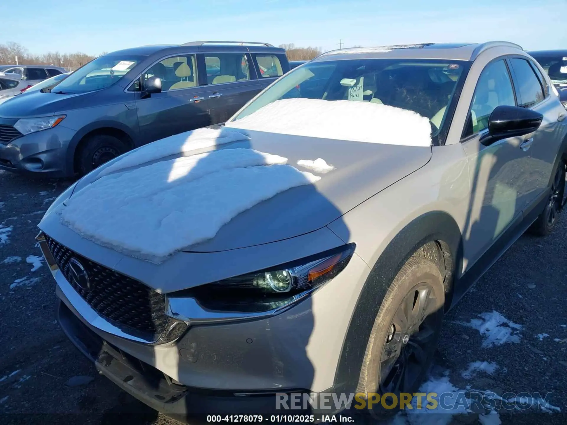 2 fotografías del automóvil dañado 3MVDMBEY7NM445788 MAZDA CX-30 2022