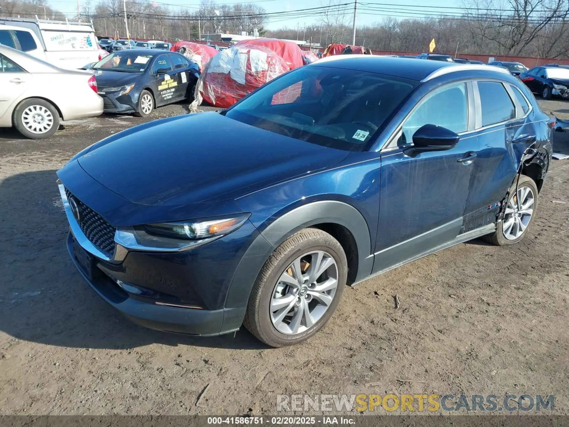 2 fotografías del automóvil dañado 3MVDMBBM2PM586062 MAZDA CX-30 2023