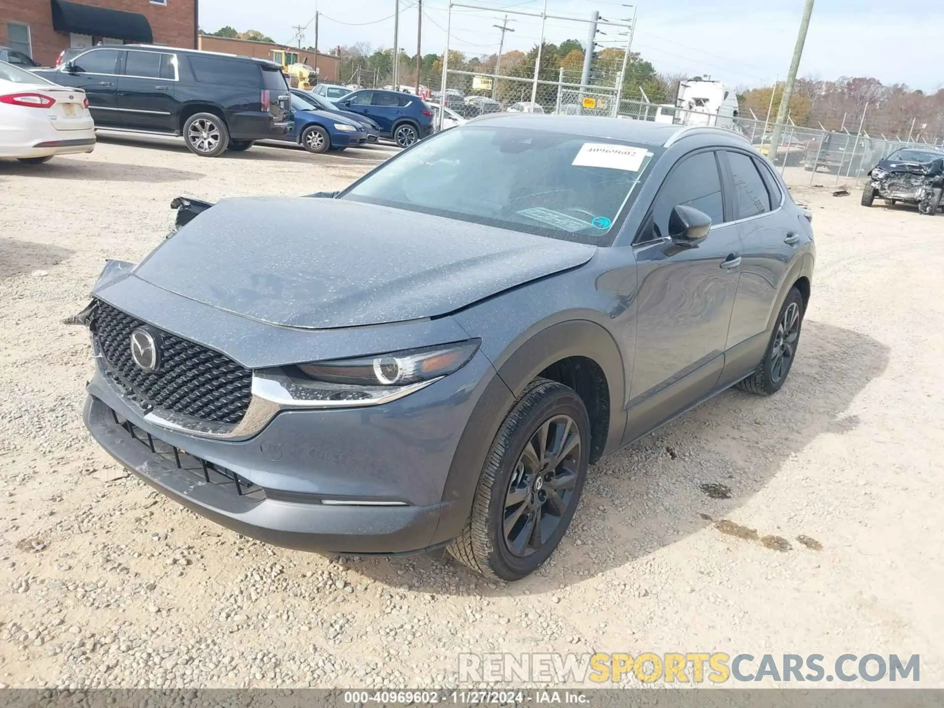 2 fotografías del automóvil dañado 3MVDMBCM1PM537644 MAZDA CX-30 2023