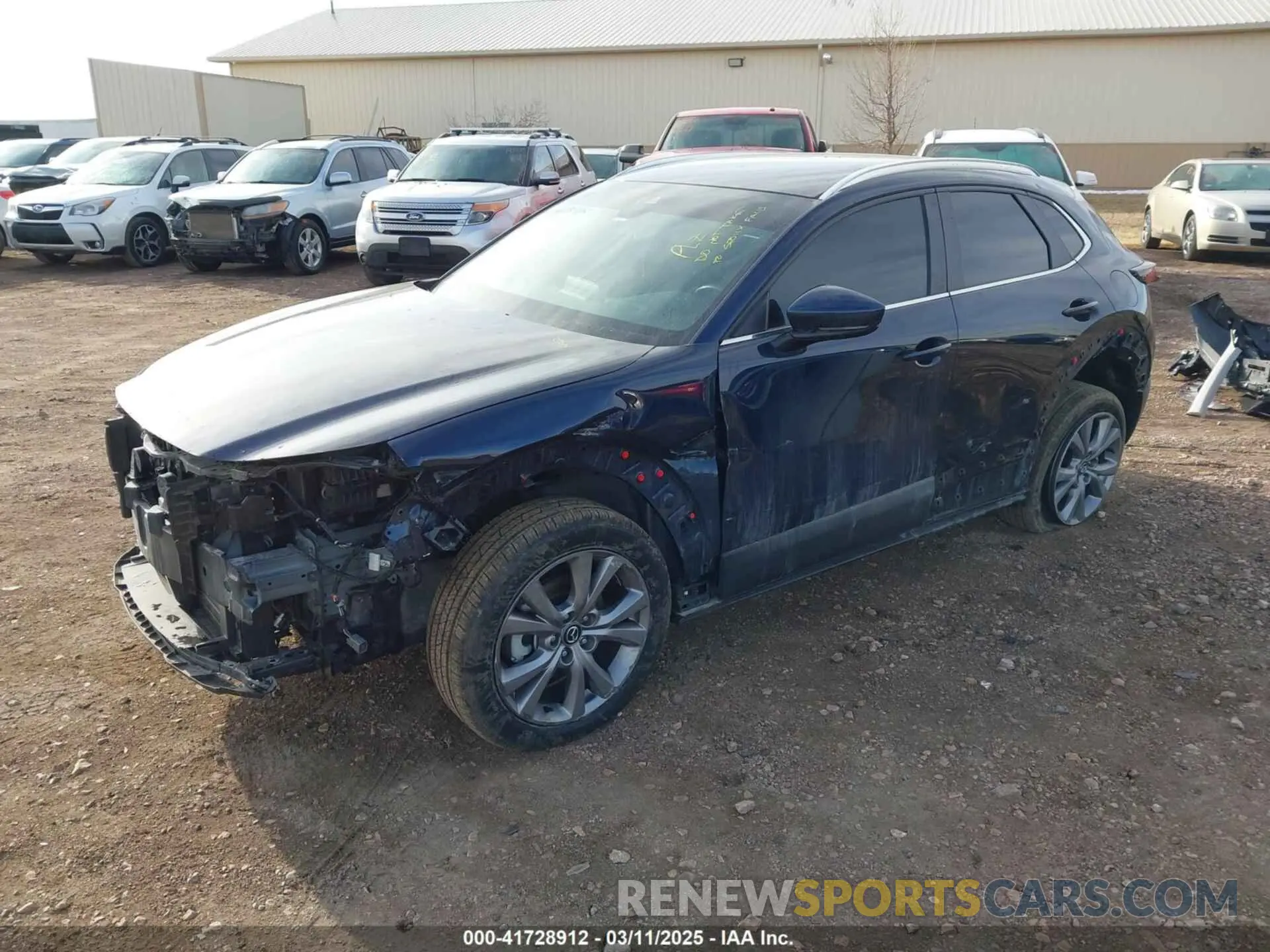 2 fotografías del automóvil dañado 3MVDMBCM2PM588506 MAZDA CX-30 2023