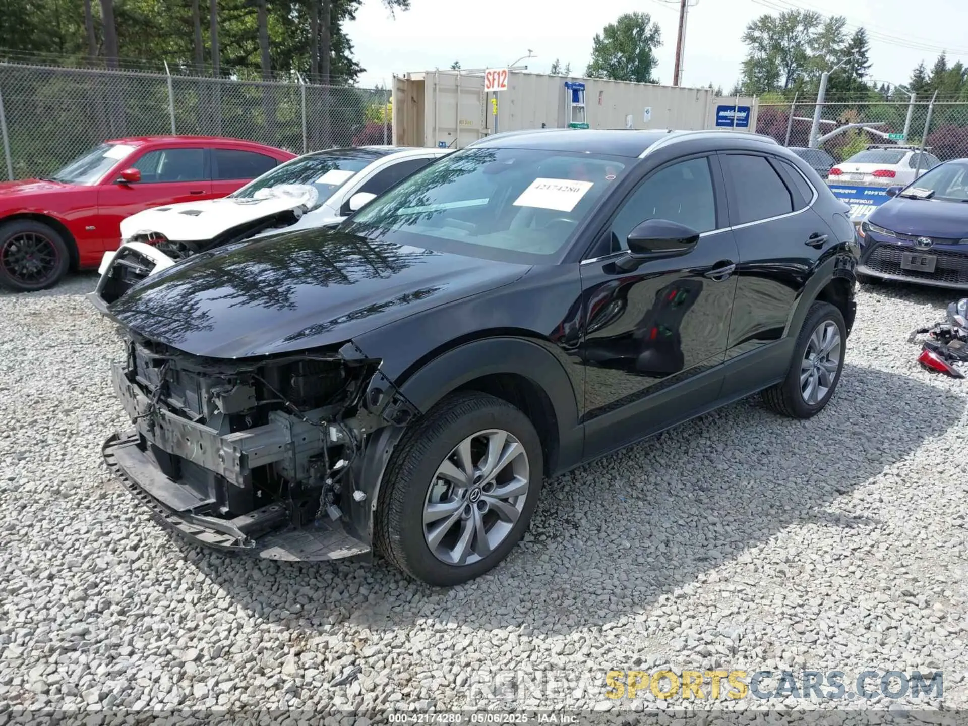 2 fotografías del automóvil dañado 3MVDMBCM3PM562447 MAZDA CX-30 2023