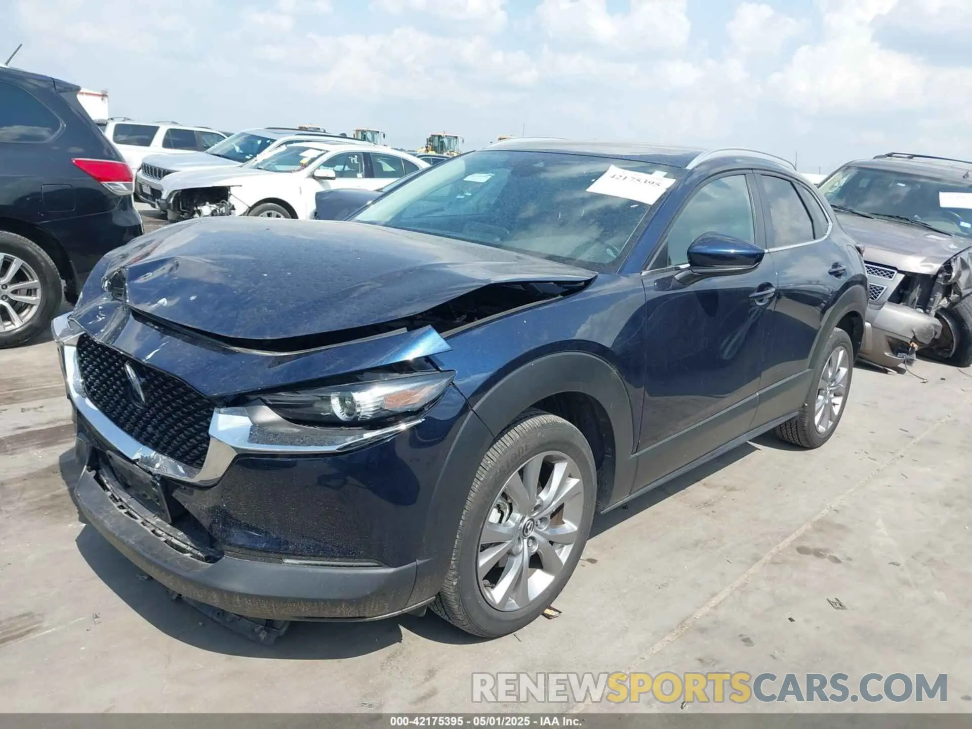 2 fotografías del automóvil dañado 3MVDMBCM4PM542160 MAZDA CX-30 2023
