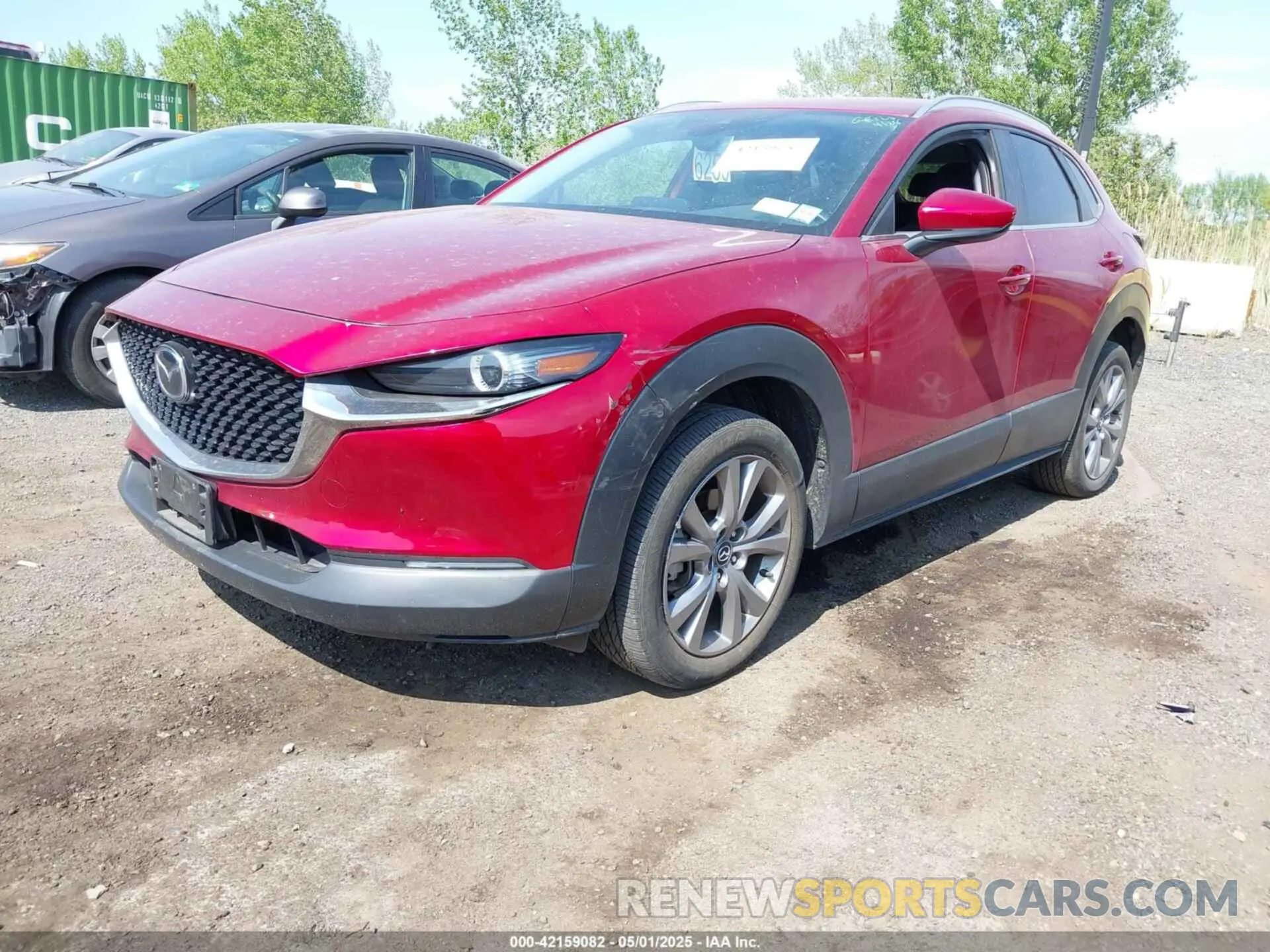 2 fotografías del automóvil dañado 3MVDMBCM7PM522324 MAZDA CX-30 2023