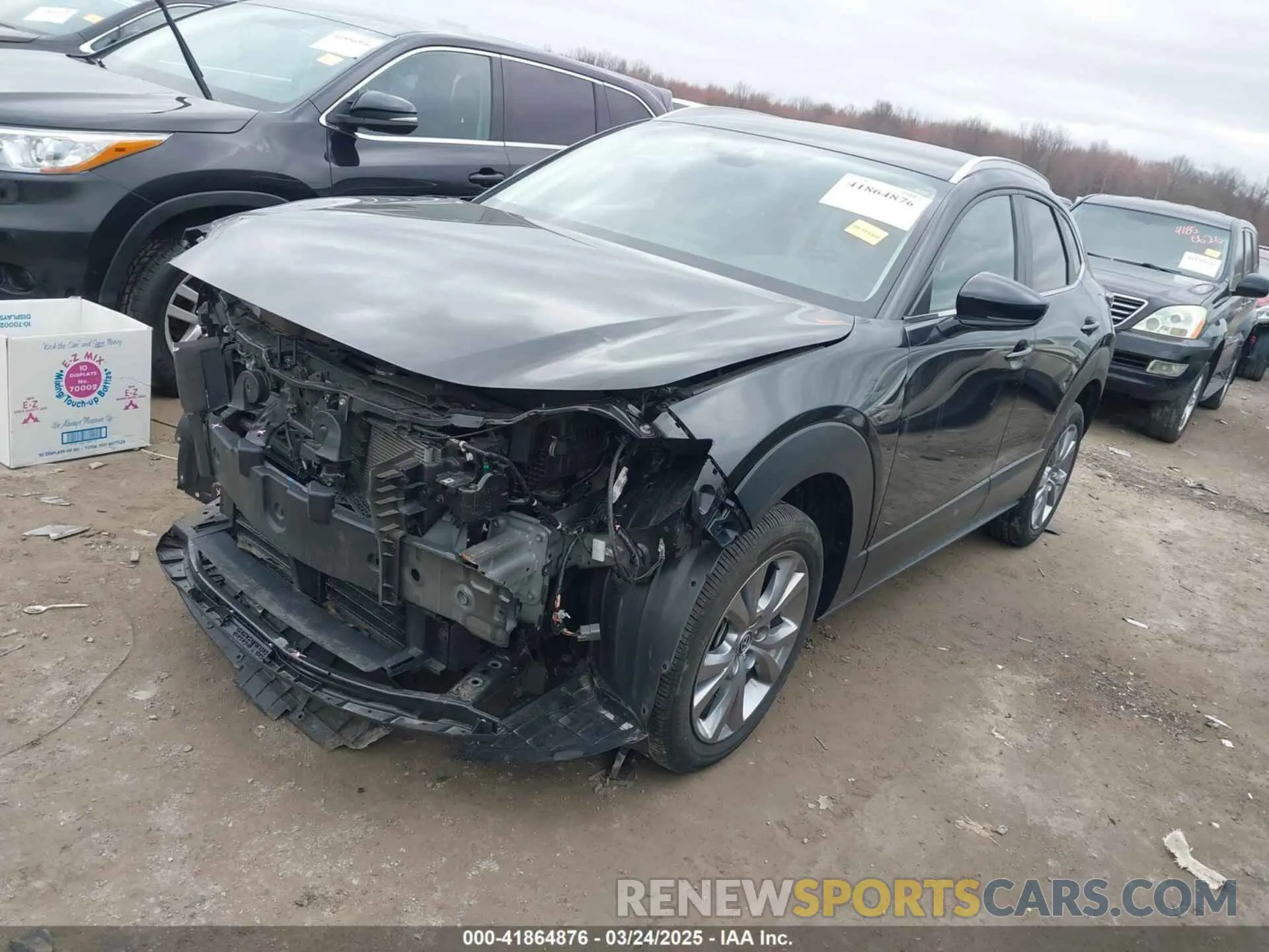 2 fotografías del automóvil dañado 3MVDMBCMXPM553129 MAZDA CX-30 2023