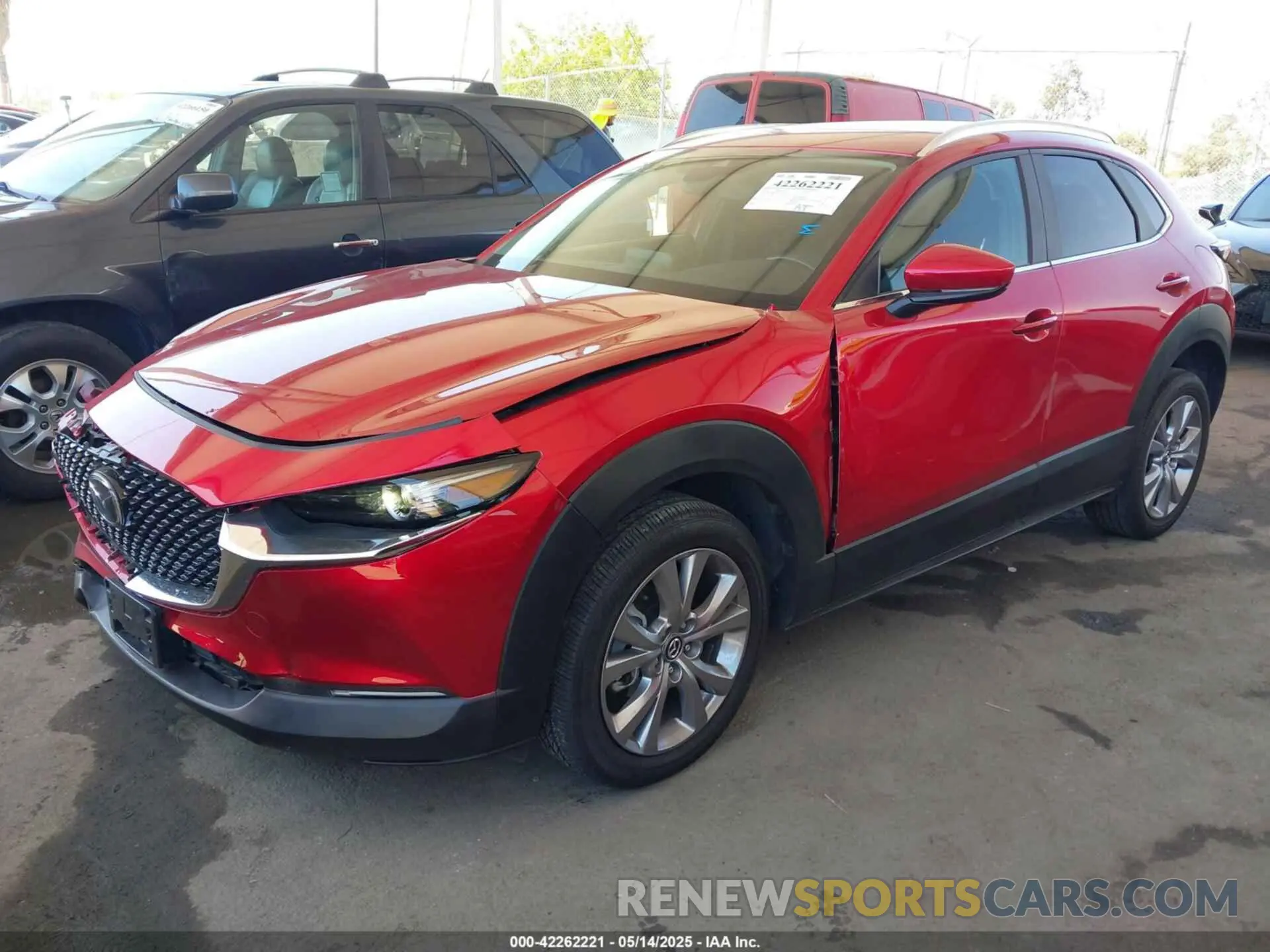 2 fotografías del automóvil dañado 3MVDMBCMXPM578516 MAZDA CX-30 2023