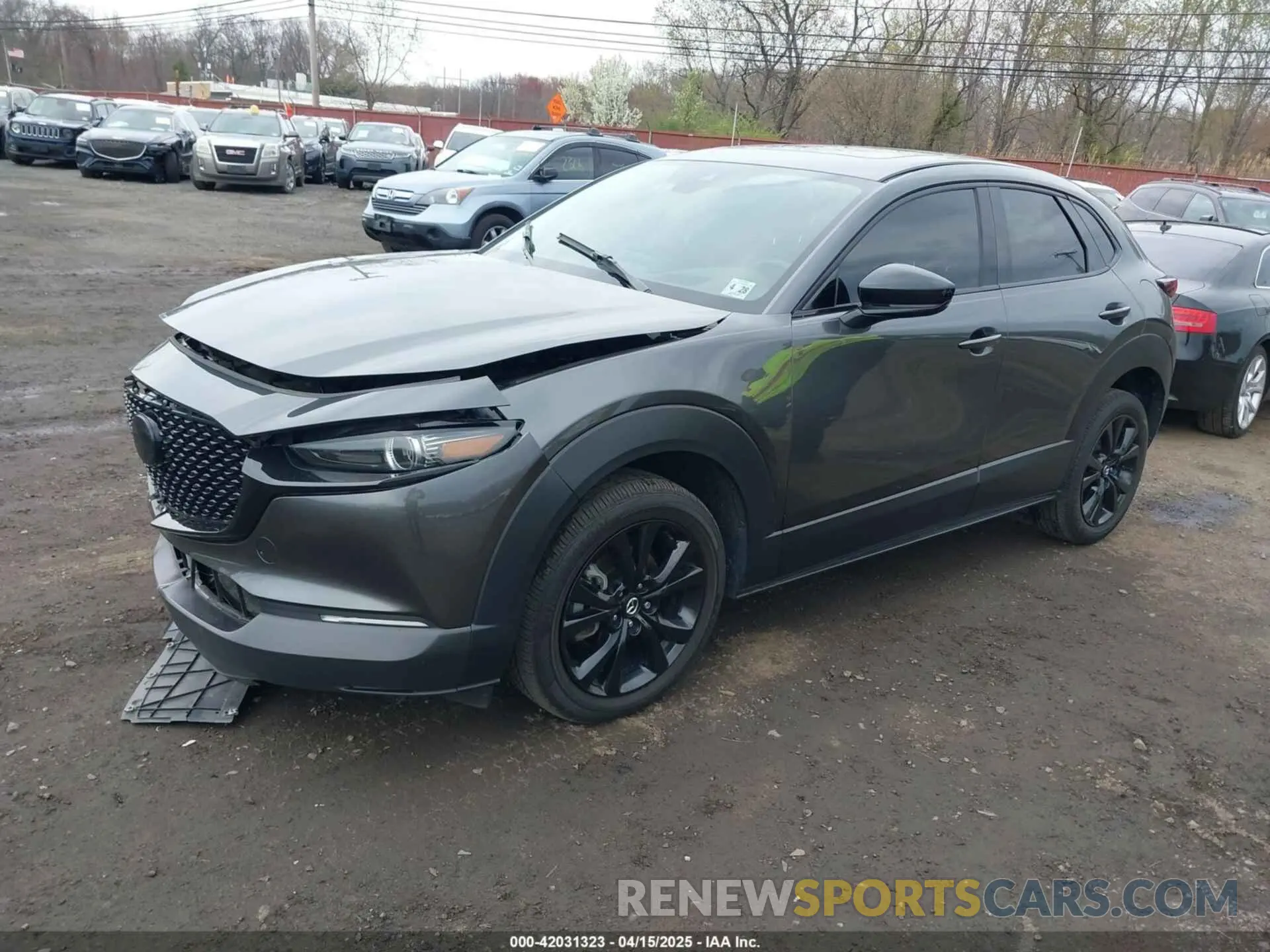 2 fotografías del automóvil dañado 3MVDMBDYXPM503073 MAZDA CX-30 2023