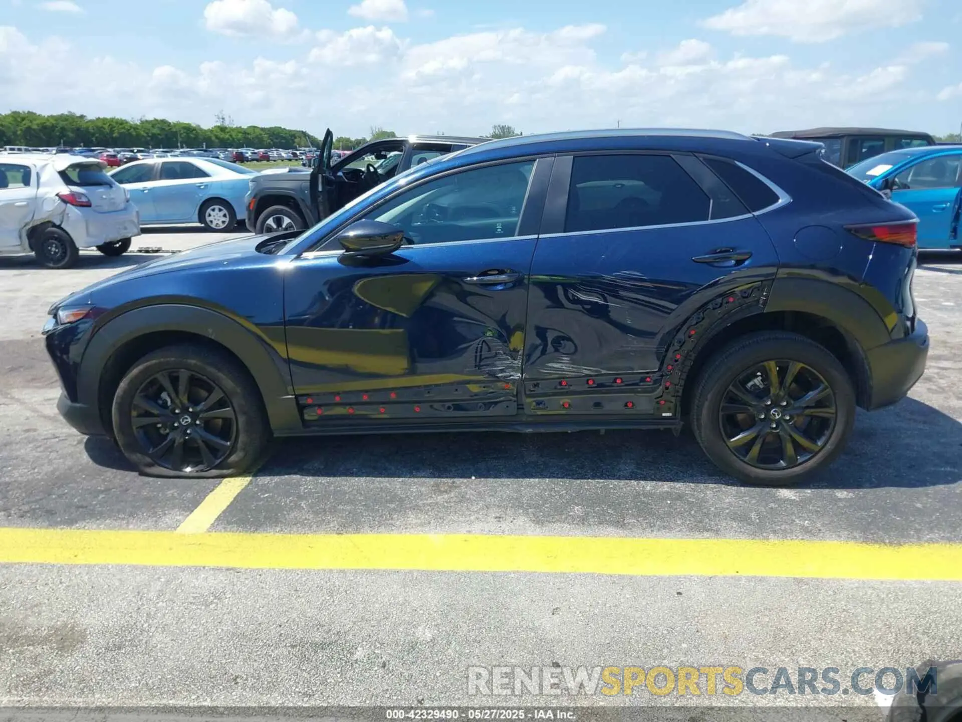 14 fotografías del automóvil dañado 3MVDMBBM0RM697731 MAZDA CX-30 2024